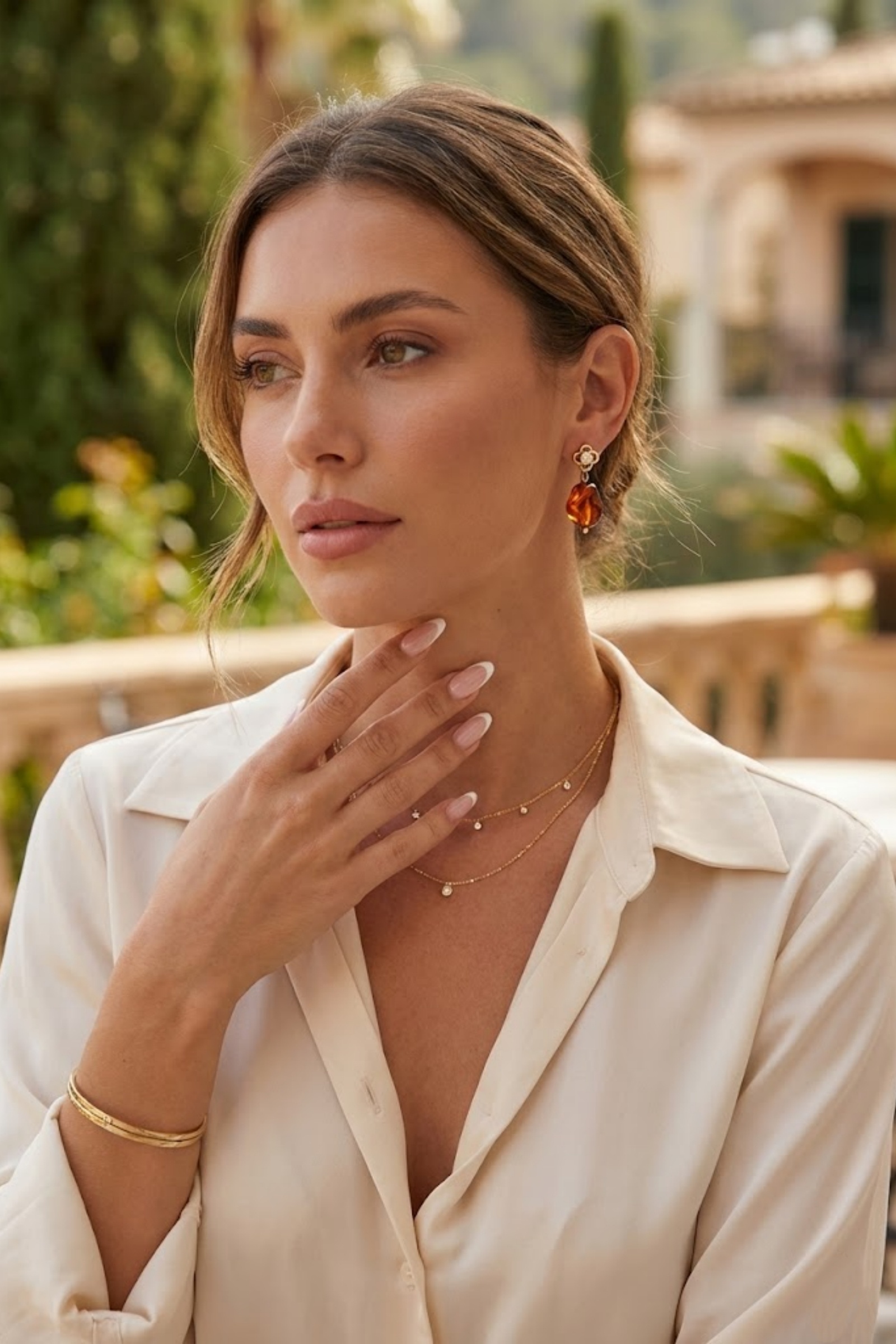 Grossiste Bellissima - Boucles d’oreilles fleur strass et résine effet ambre en acier inoxydable