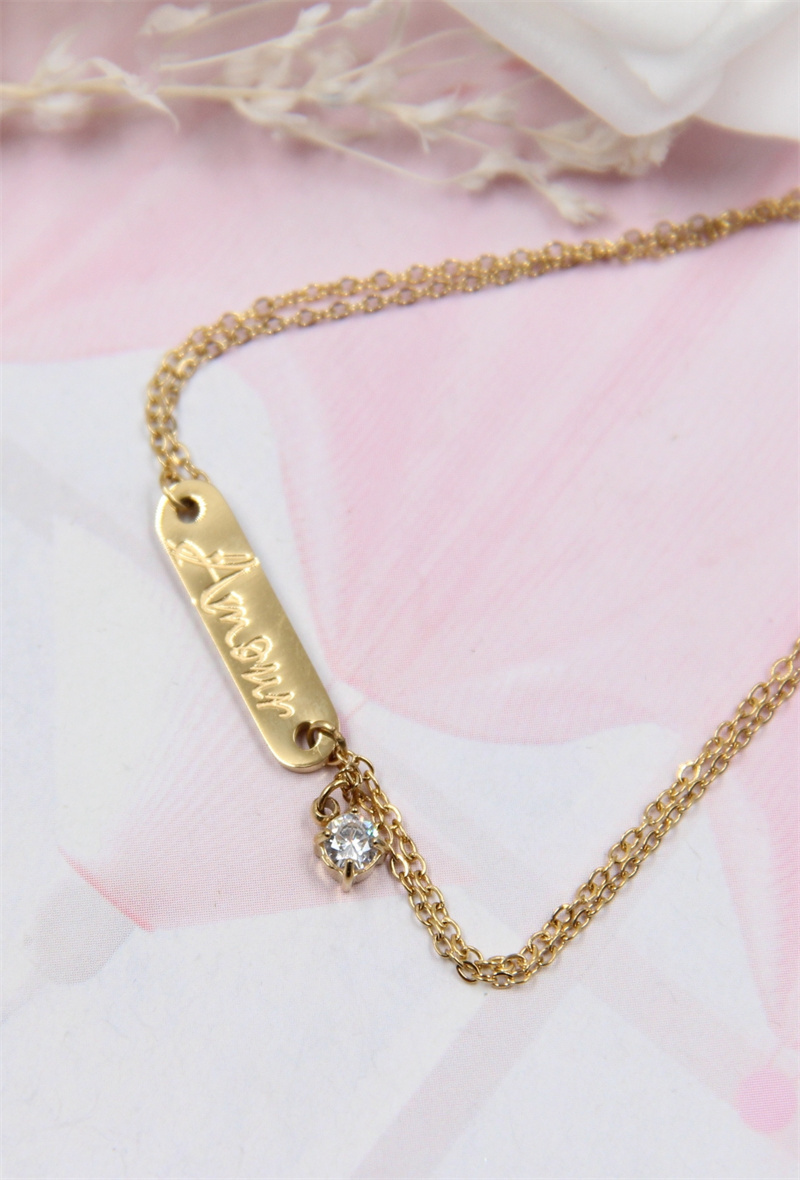 Mayorista Bellissima - Pulsera de acero con mensaje “LOVE” y strass