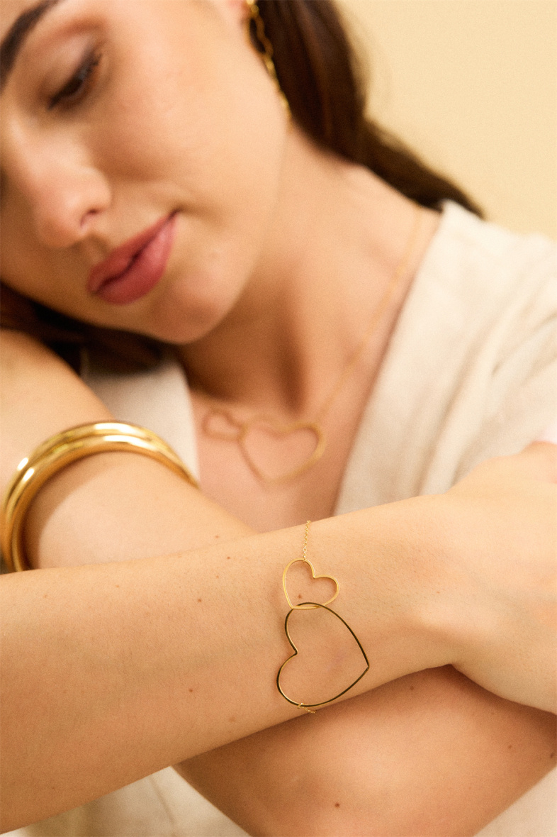 Grossiste Bellissima - Bracelet 2 cœurs entrelacés en acier inoxydable