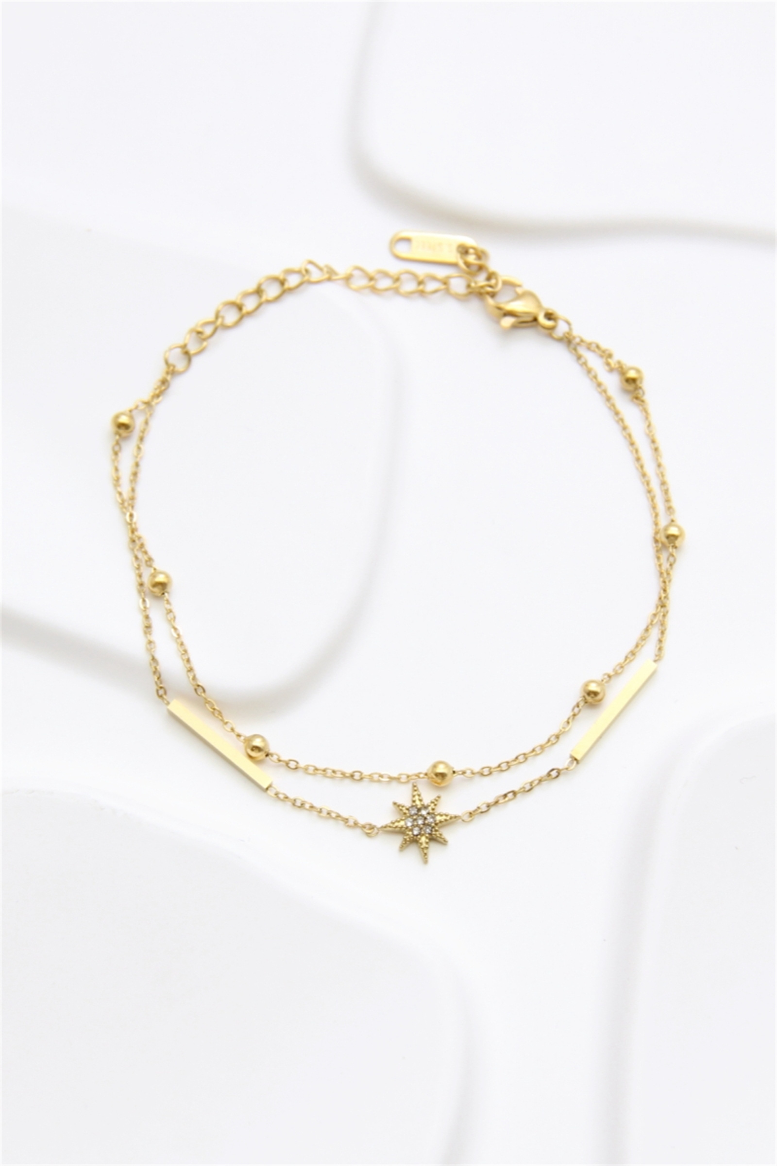 Grossiste Bellissima - Bracelet double chaîne doré en acier inoxydable – étoile scintillante & bar