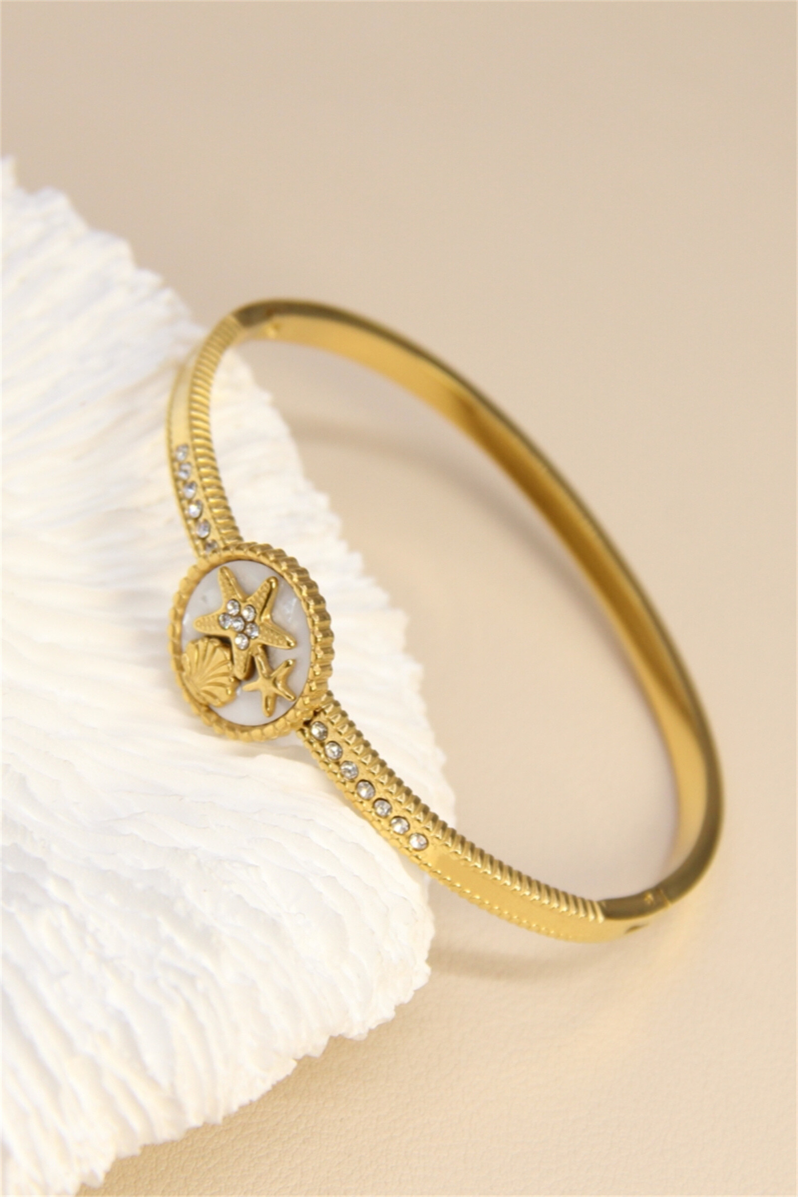Grossiste Bellissima - Bracelet jonc mer en acier inoxydable – Étoiles de mer & coquillages