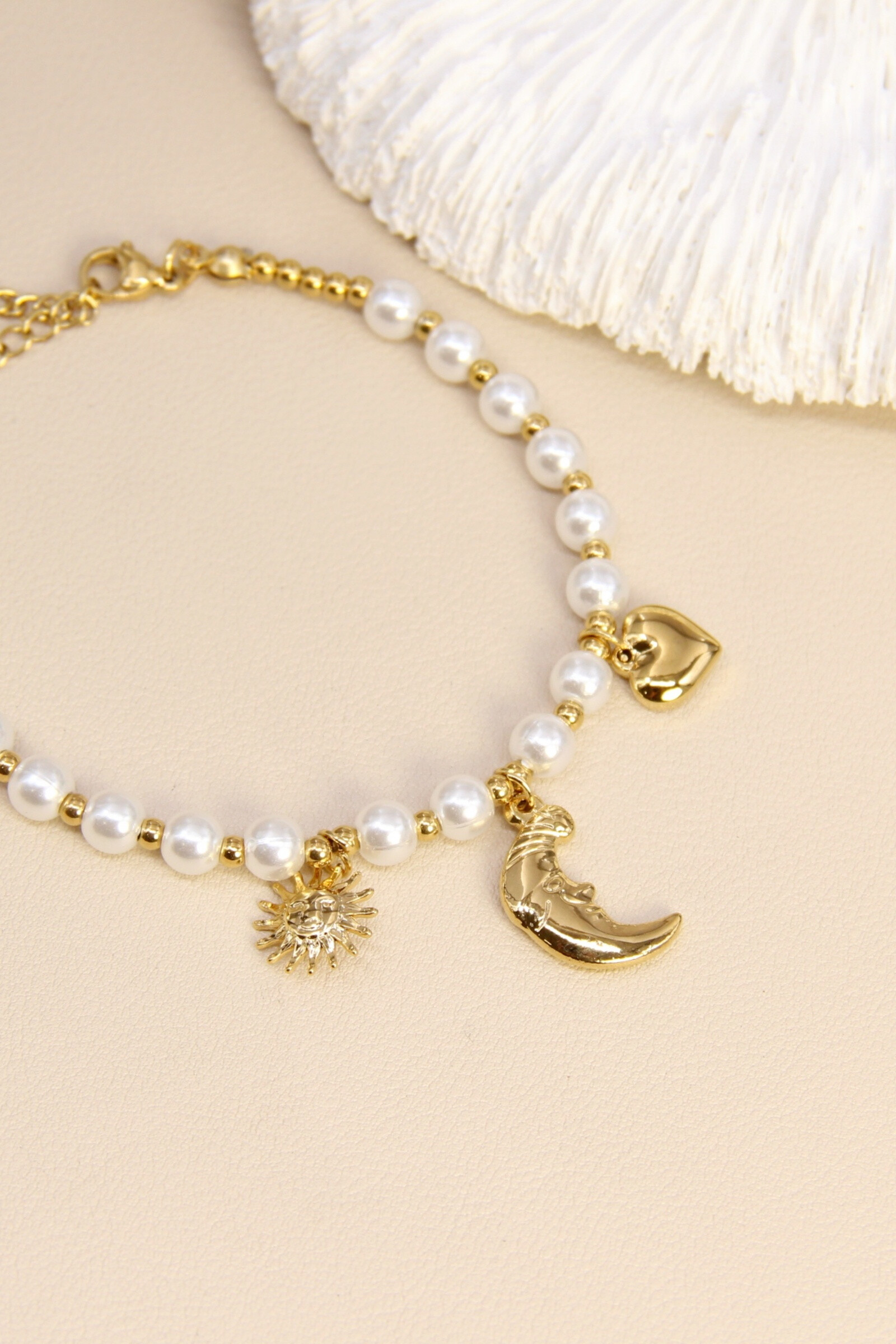Mayorista Bellissima - Pulsera perlas sol luna corazón - Joyería elegante y de moda