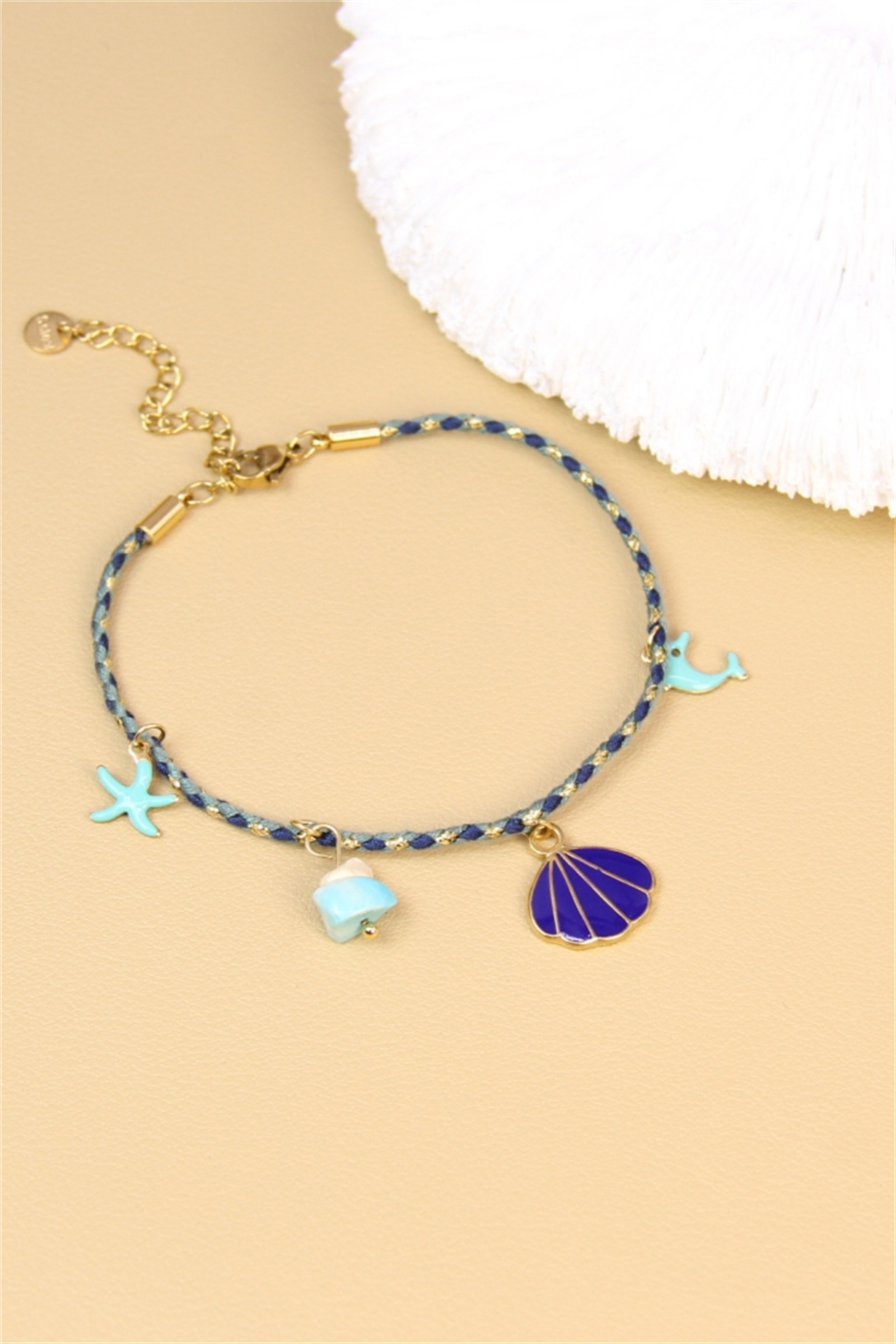 Grossista Bellissima - Braccialetto marino in corda intrecciata blu - Ciondoli conchiglia, stella marina e delfino