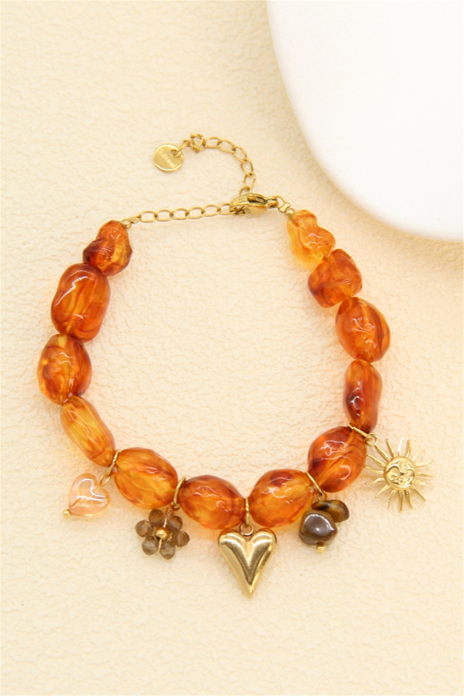 Wholesaler Bellissima - Amber Resin Bead Bracelet & Gold Charms – Radiant Bohemian Style