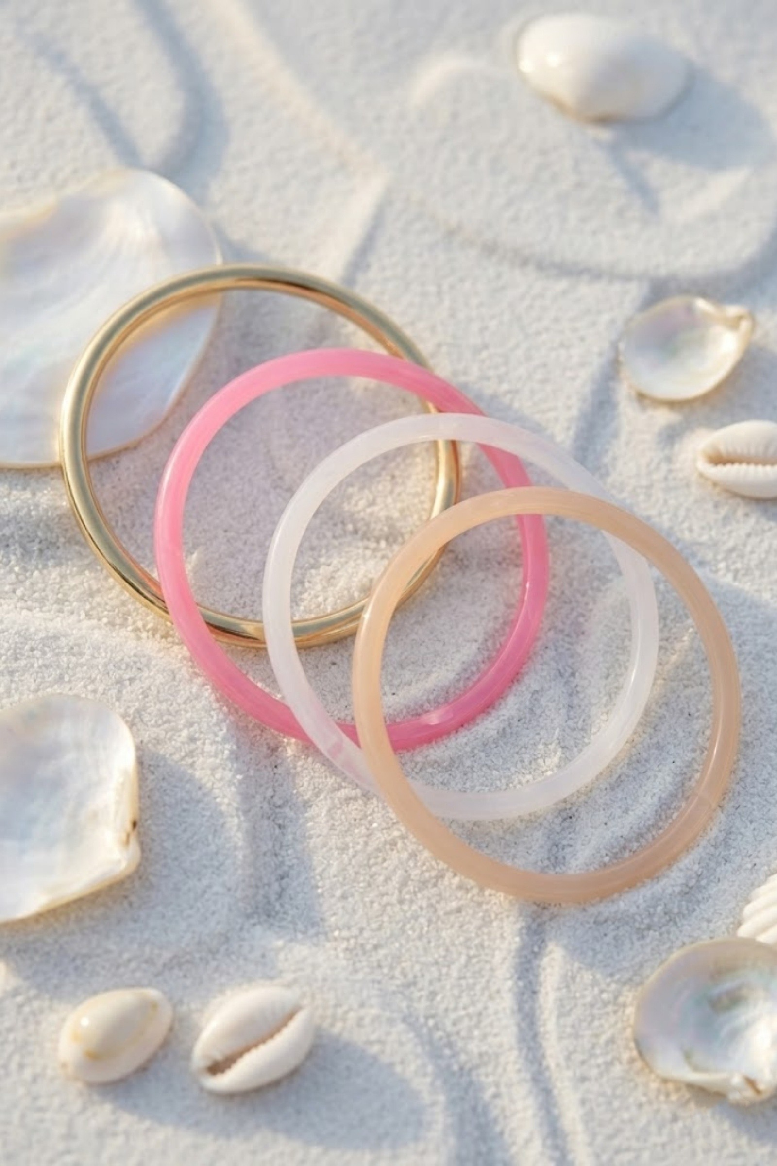 Mayorista Bellissima - Juego de 4 Pulseras de Resina Pastel – Moda & Elegancia