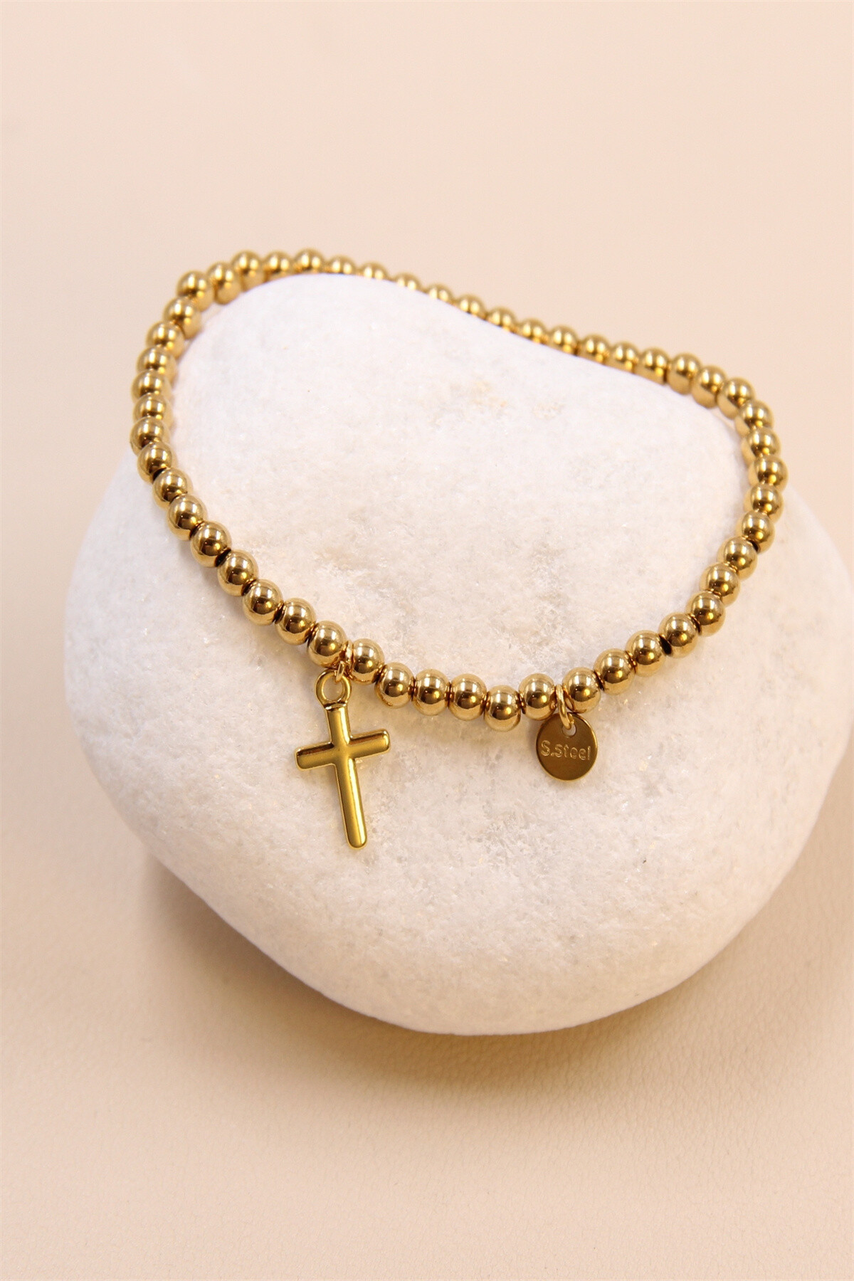 Grossiste Bellissima - Bracelet élastique croix en acier inoxydable : une déclaration spirituelle