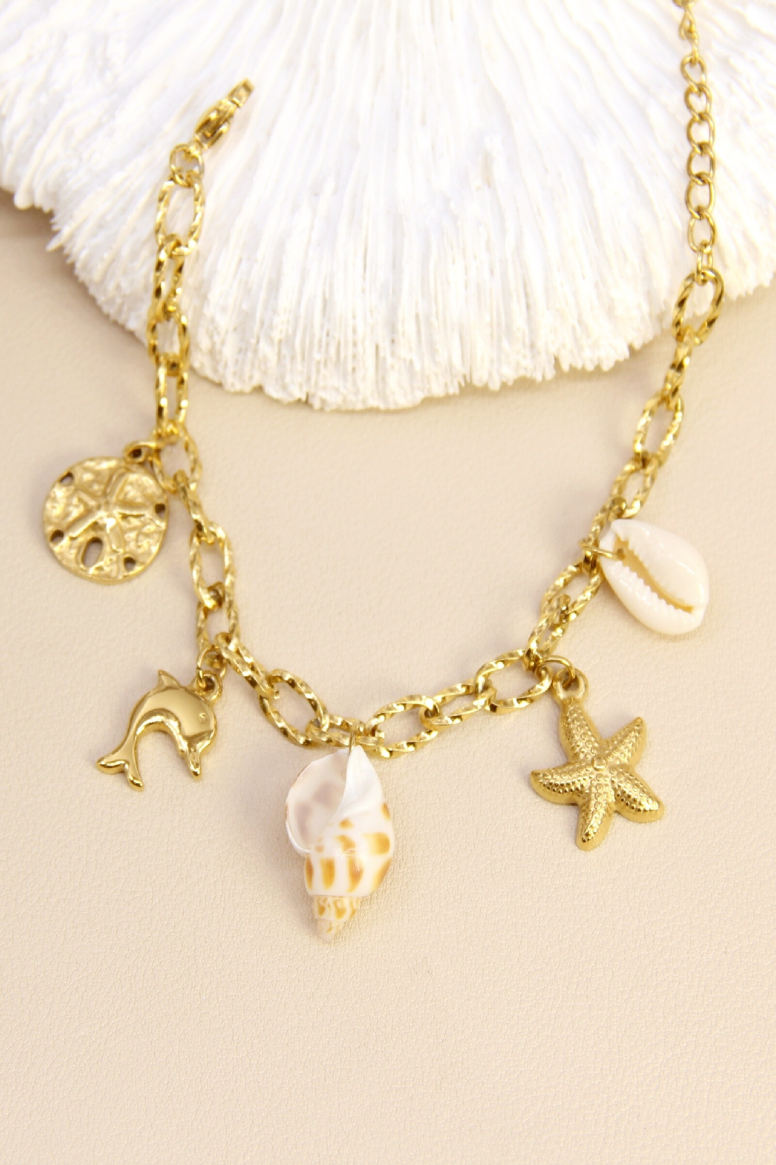 Mayorista Bellissima - Pulsera de acero inoxidable y conchas marinas