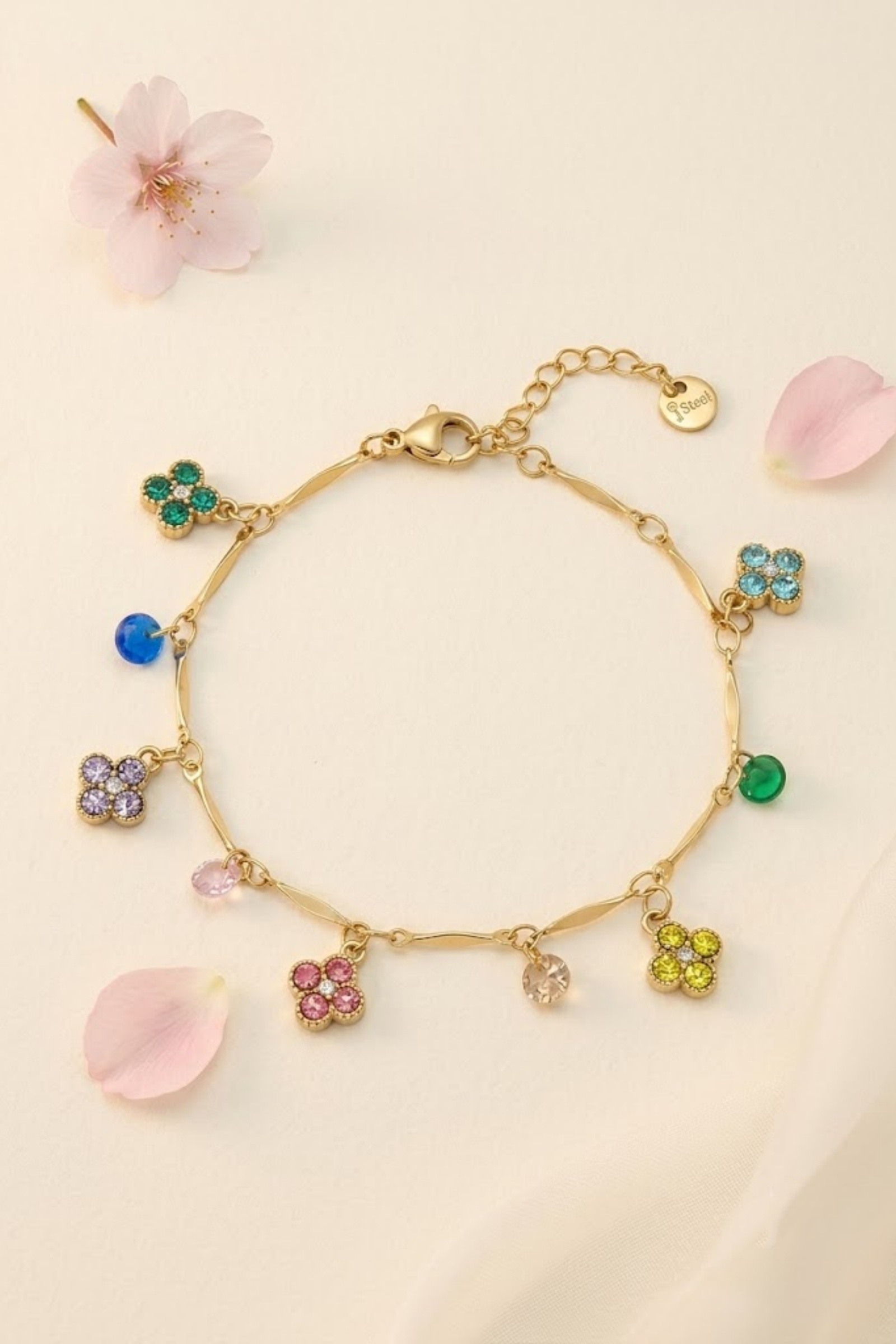 Mayorista Bellissima - Pulsera de Acero Inoxidable con Dijes de Flores y Strass – Encanto Colorido y Refinado