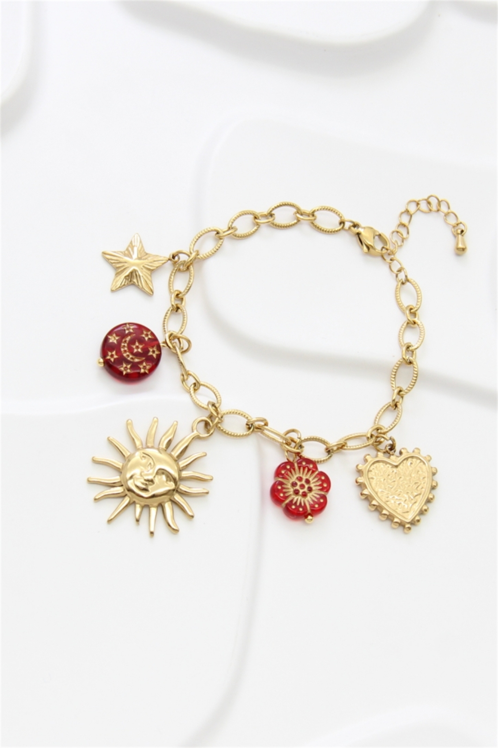 Grossiste Bellissima - Bracelet charms doré Soleil, Cœur et Étoiles en acier inoxydable