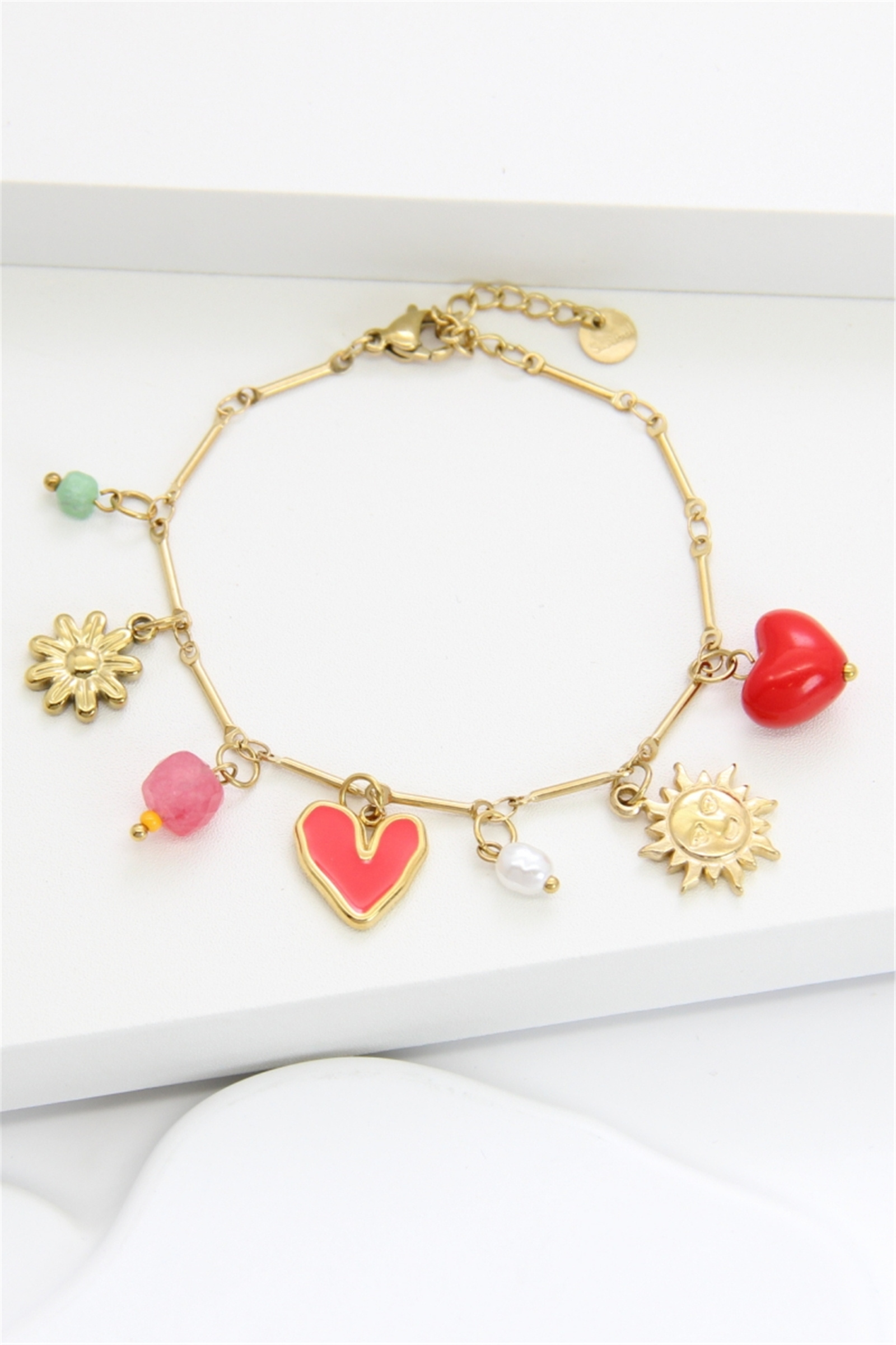 Grossiste Bellissima - Bracelet acier inoxydable doré charms cœur soleil perle fleur