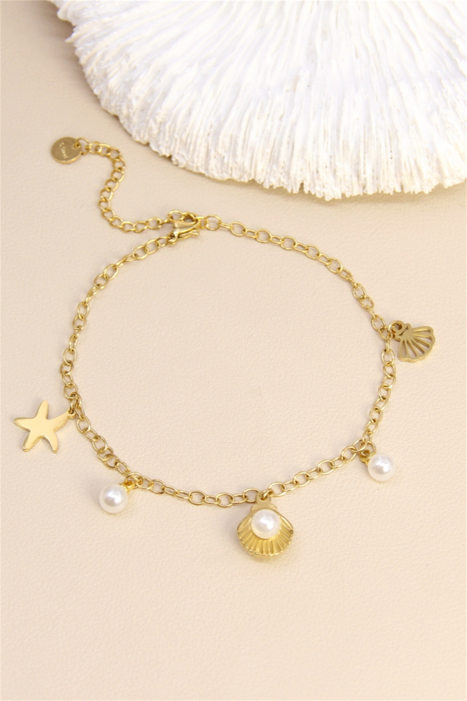 Wholesaler Bellissima - Starfish seashell bracelet - Gold stainless steel and pearly beads
