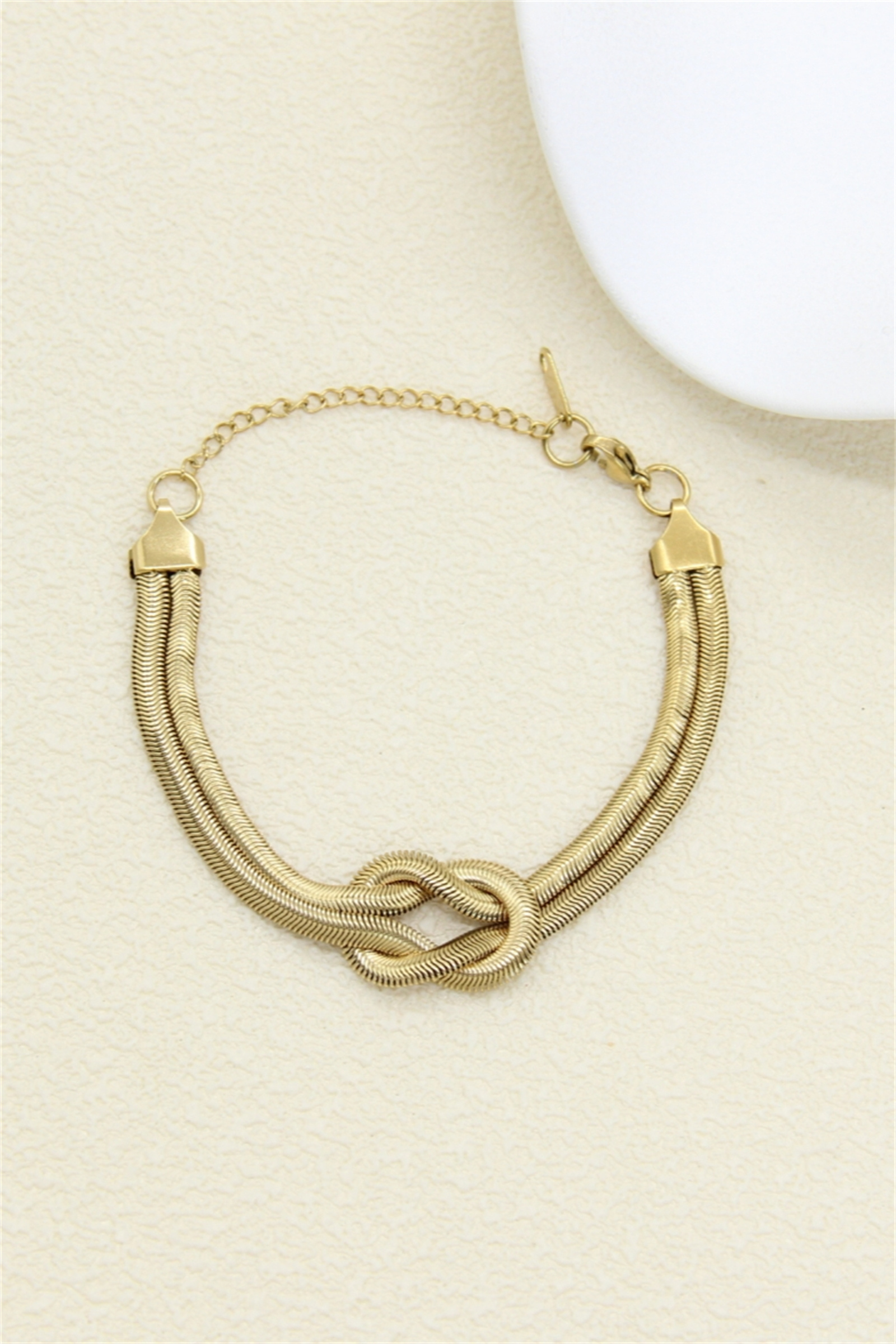 Grossiste Bellissima - Bracelet nœud doré en acier inoxydable – Élégance moderne