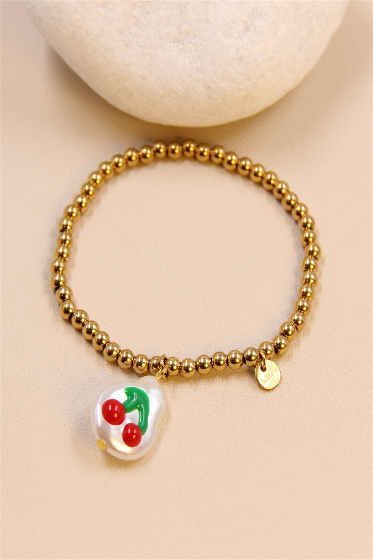 Grossiste Bellissima - Bracelet élastique cerise en acier inoxydable : fraîcheur de style
