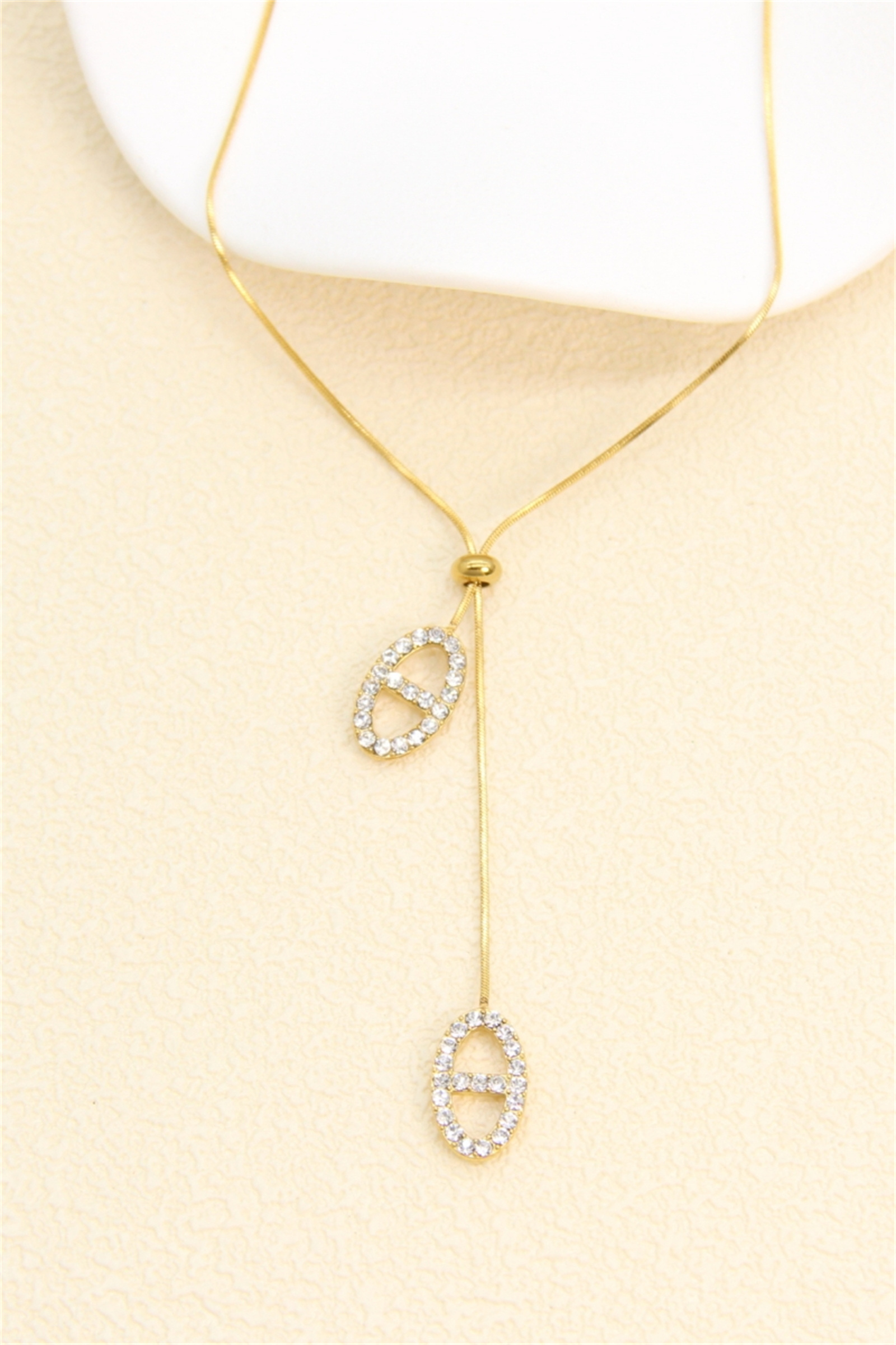 Grossiste Bellissima - Collier boucle marine strass en acier inoxydable – coulissant ajustable