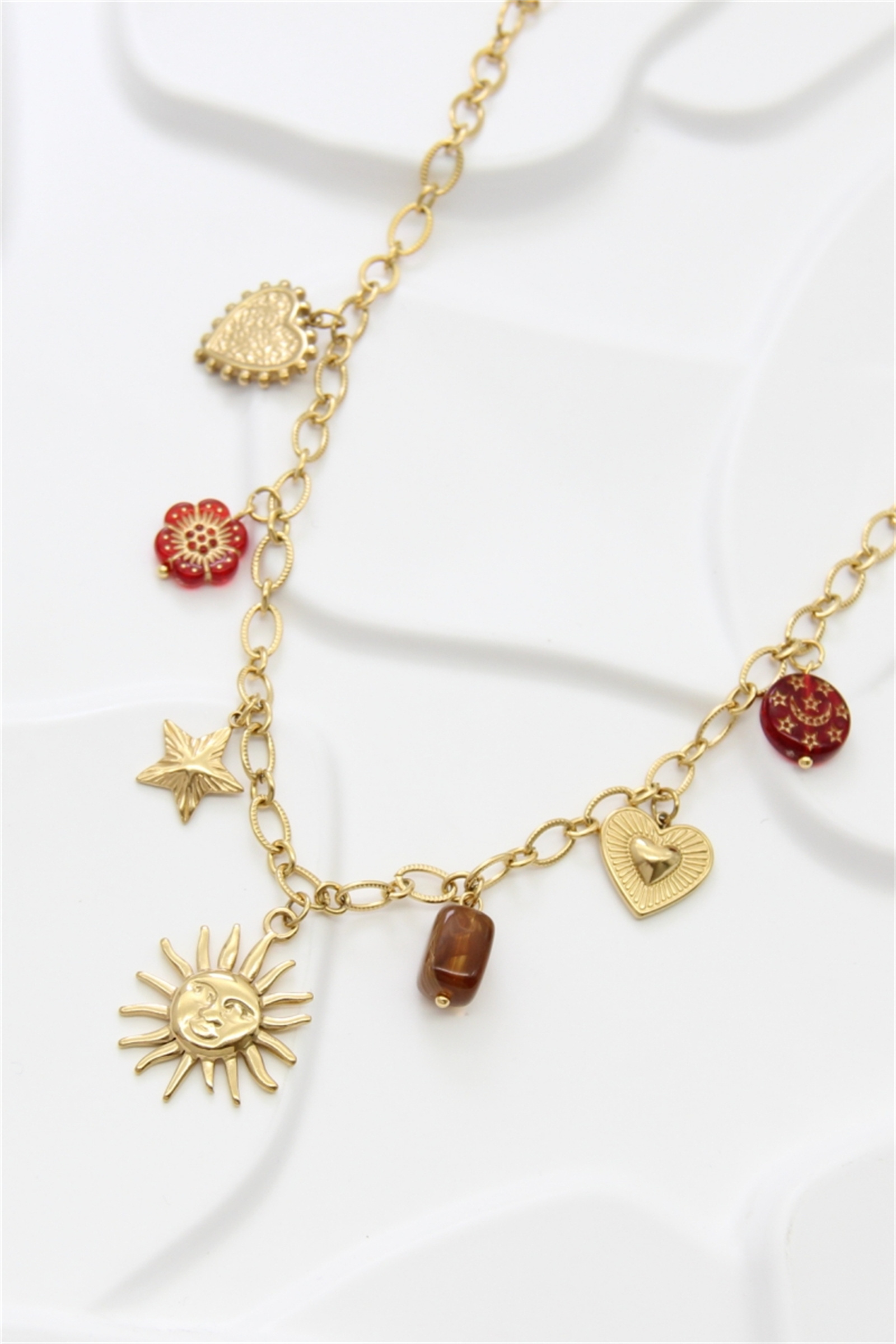 Grossiste Bellissima - Collier charms soleil et cœur en acier inoxydable doré