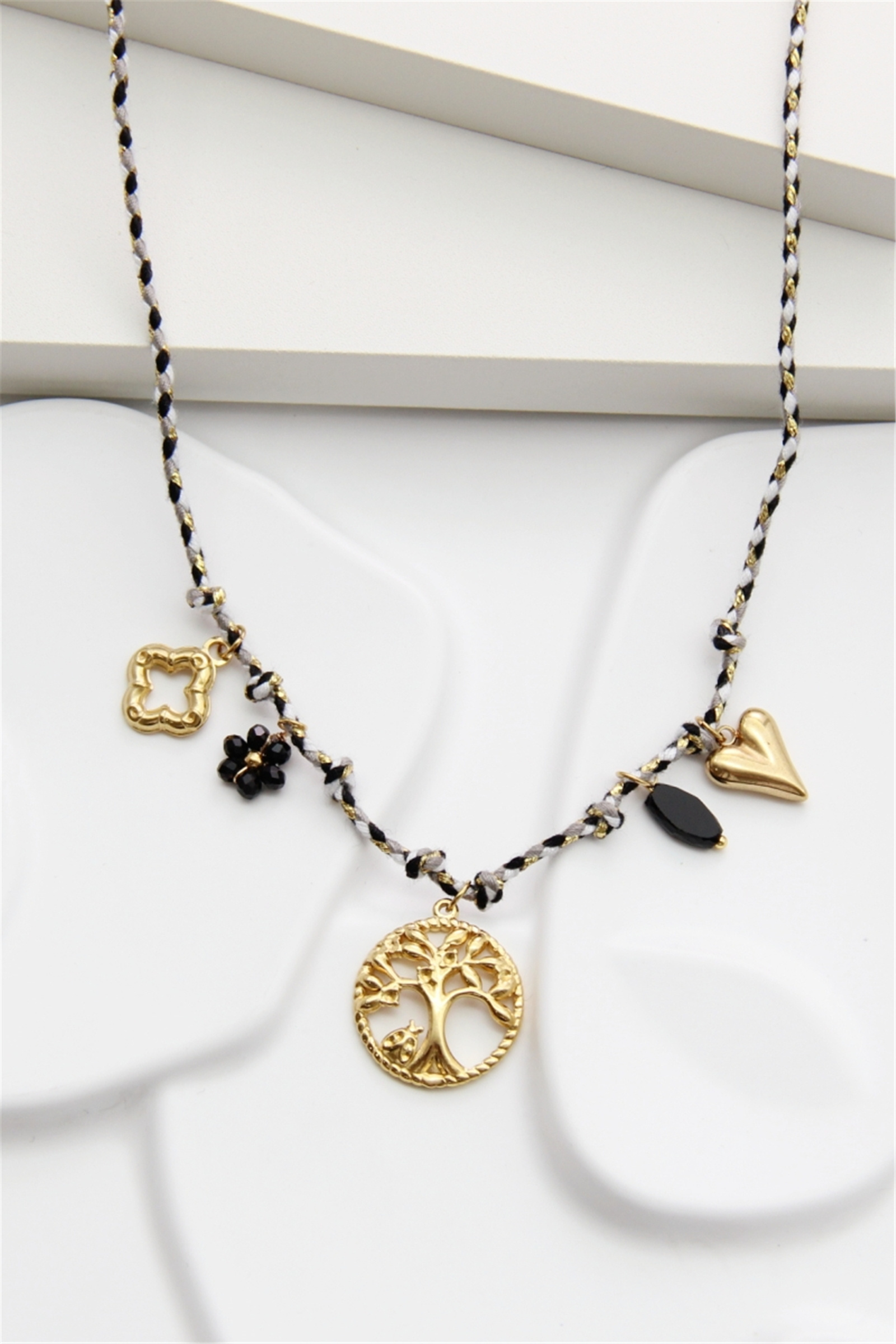 Grossiste Bellissima - Collier Arbre de Vie tressé noir et doré – Symbole d’harmonie et d’élé