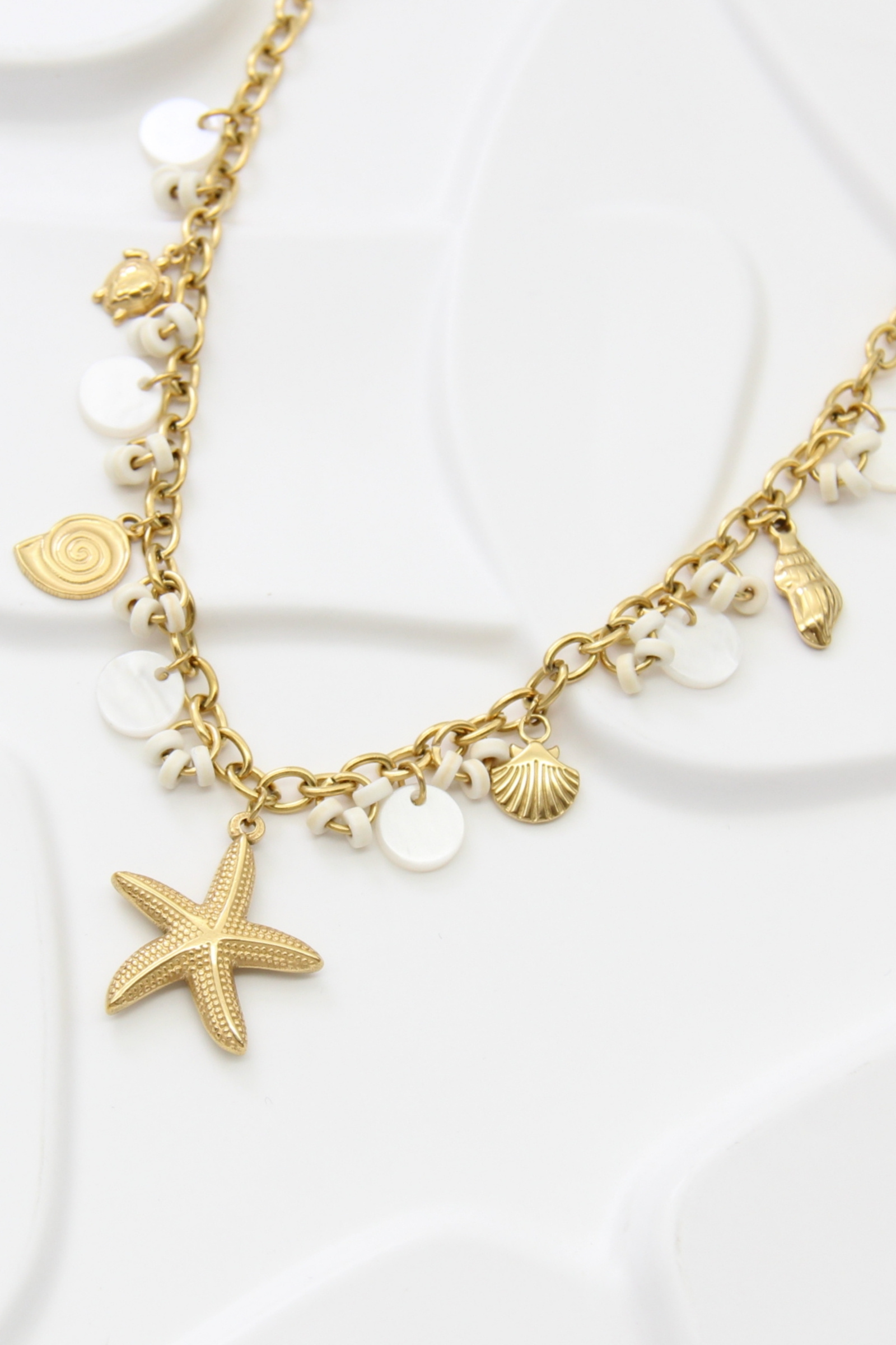 Grossiste Bellissima - Collier étoile de mer en acier inoxydable doré – Charms marins tendance