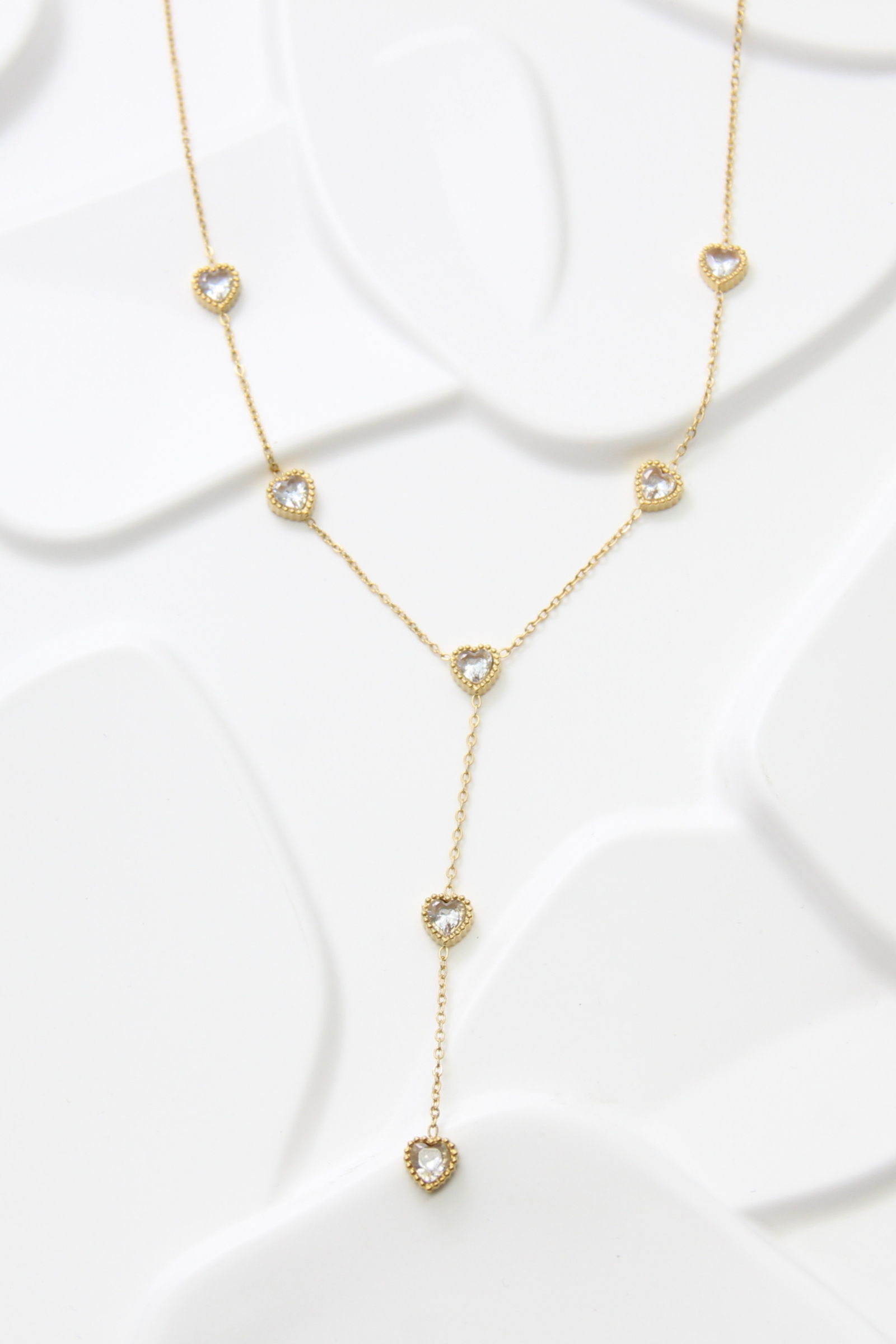 Grossiste Bellissima - Collier sautoir cœurs en acier inoxydable avec pierres scintillantes