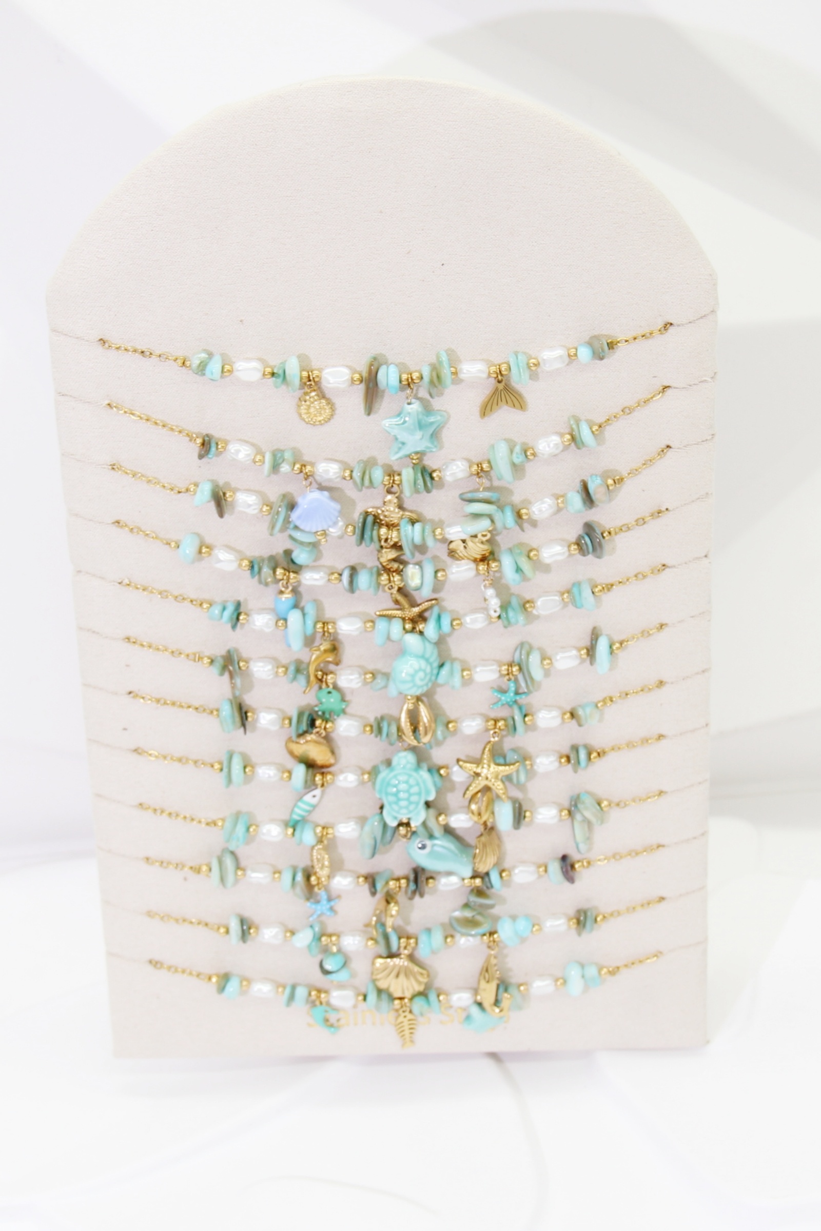 Grossiste Bellissima - Lot de 12 Colliers Marin Turquoise en Acier Inoxydable – Modèles Assortis avec Présentoir Offert