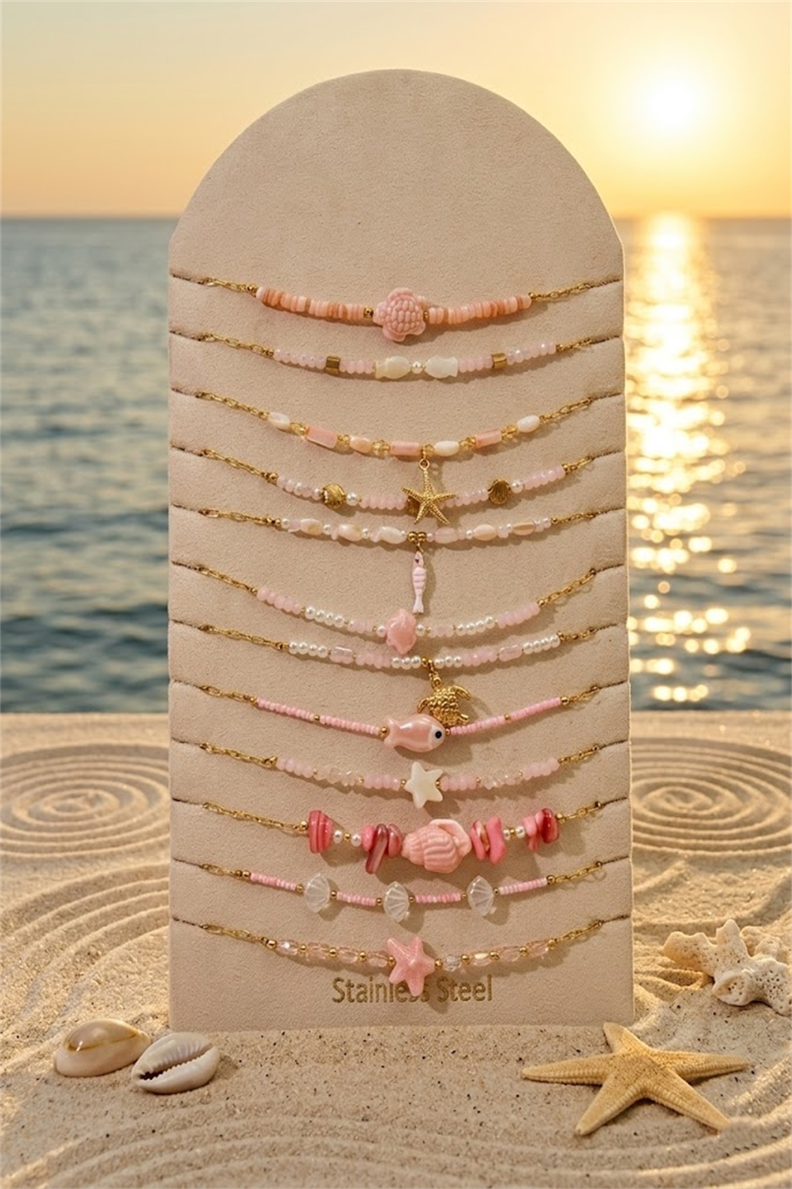 Mayorista Bellissima - Lote de 12 Collares Tema Marino Rosa Acero Inoxidable – Modelos Variados + Expositor Gratis