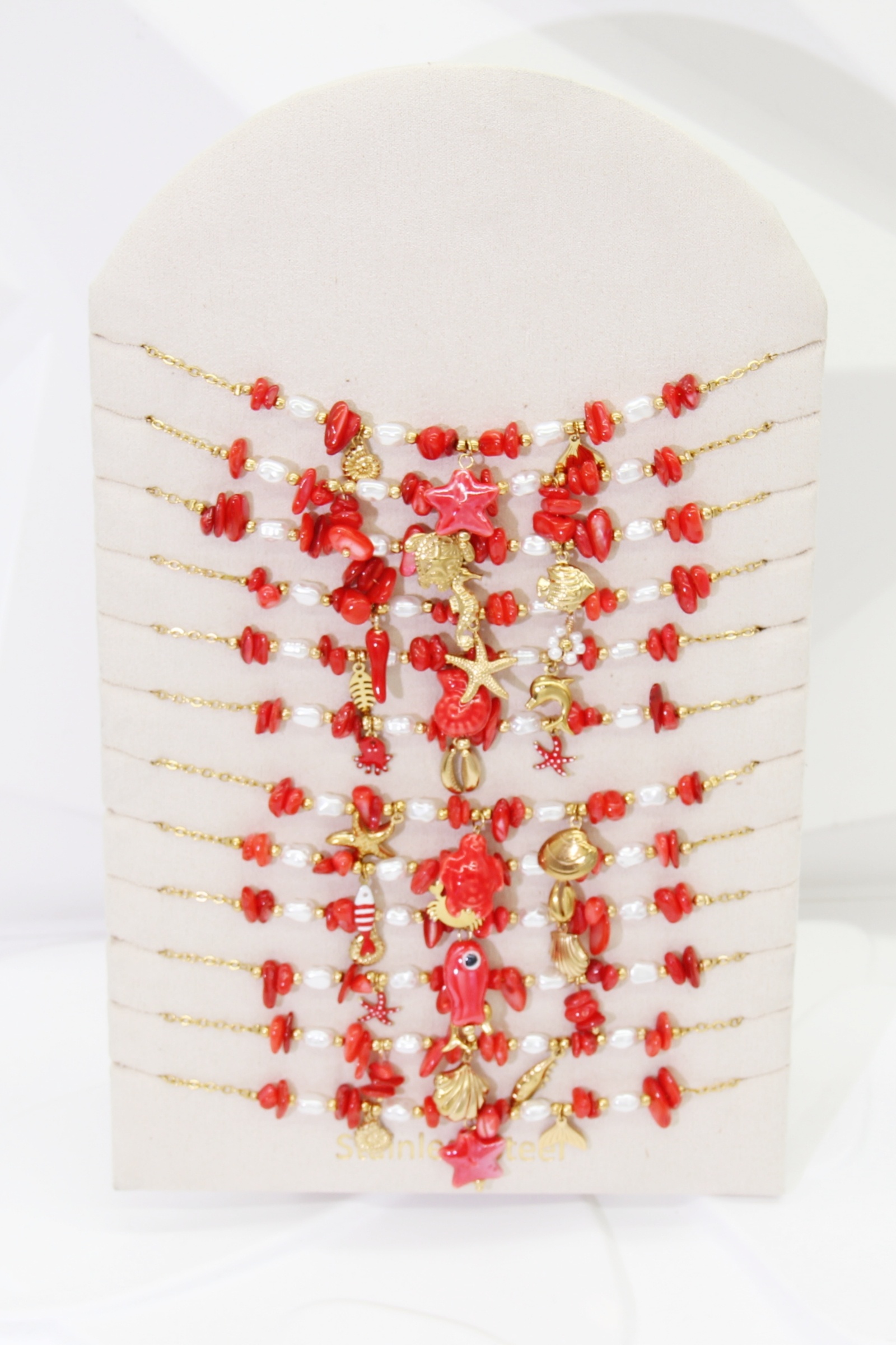 Grossiste Bellissima - Lot de 12 Colliers Marin Rouge Corail en Acier Inoxydable – Modèles Assortis avec Présentoir Offert