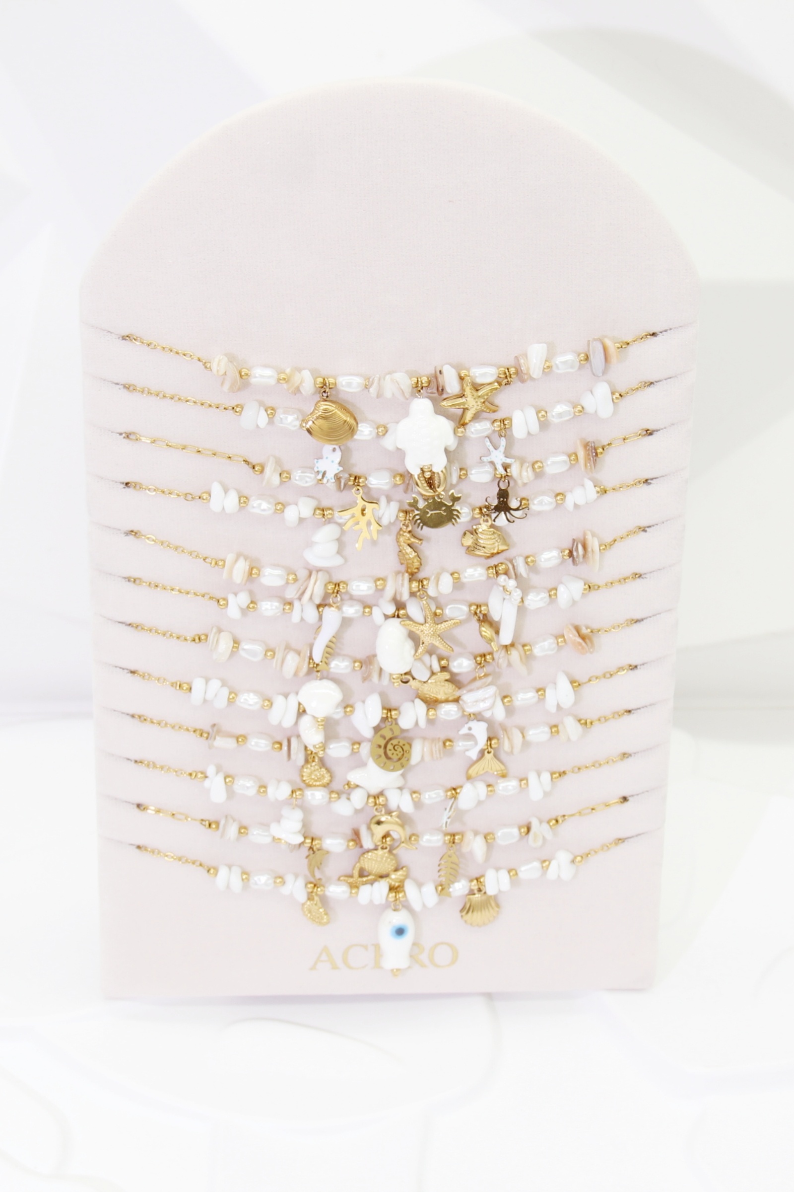 Grossiste Bellissima - Lot de 12 Colliers Marin Blanc en Acier Inoxydable – Modèles Assortis avec Présentoir Offert