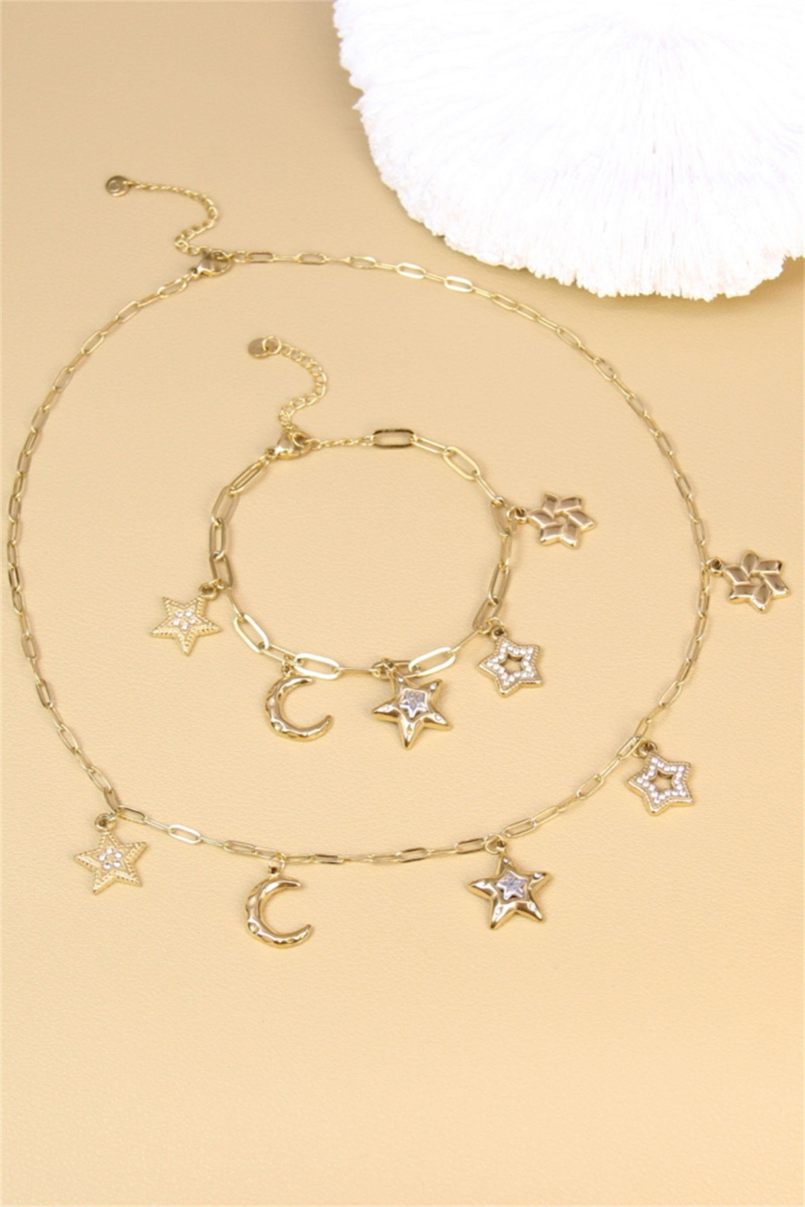 Großhändler Bellissima - Edelstahl Schmuckset vergoldet - Mond & Sterne - Trendige himmlische Anhänger