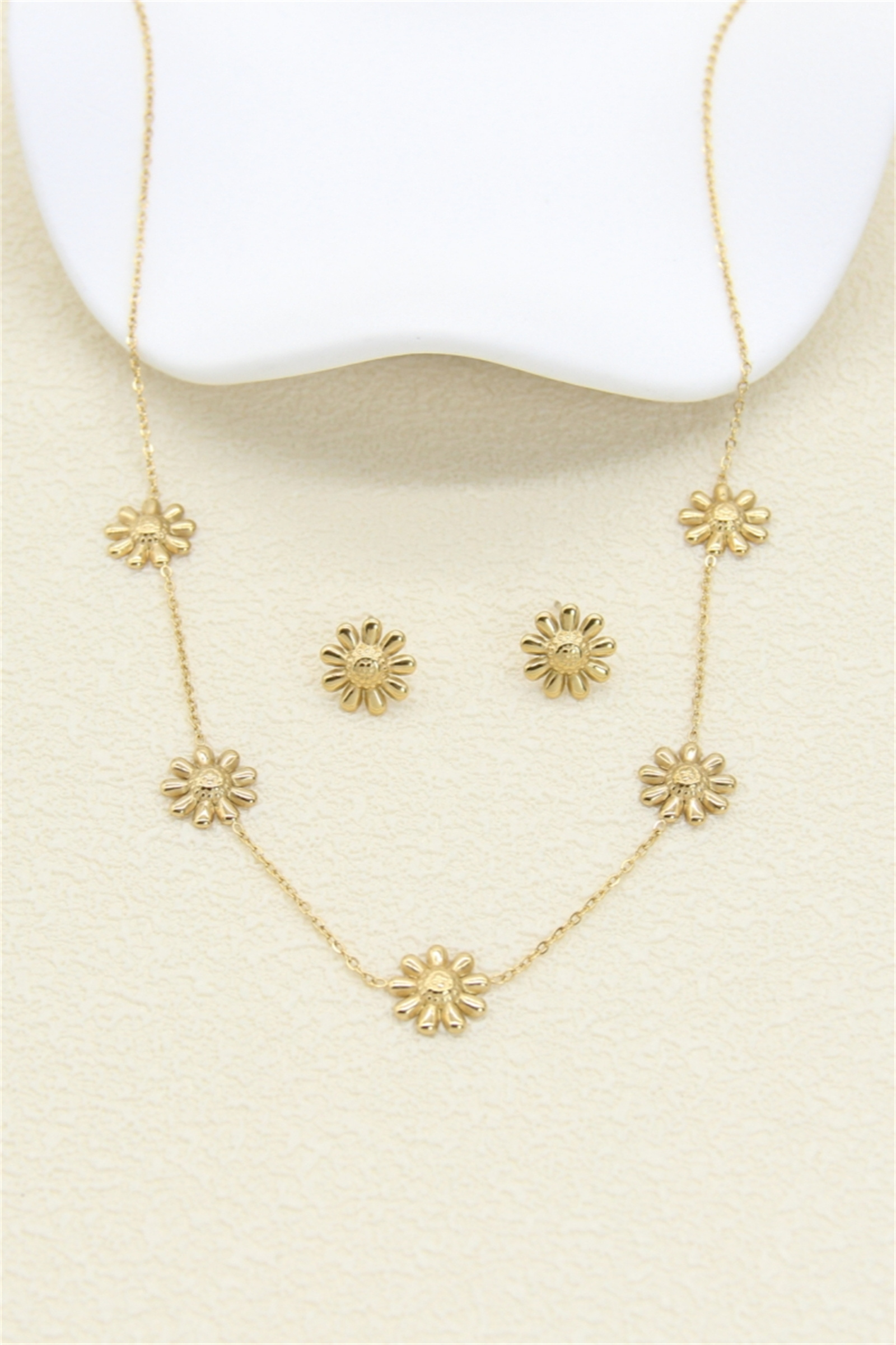 Grossiste Bellissima - Parure fleur marguerite dorée – acier inoxydable