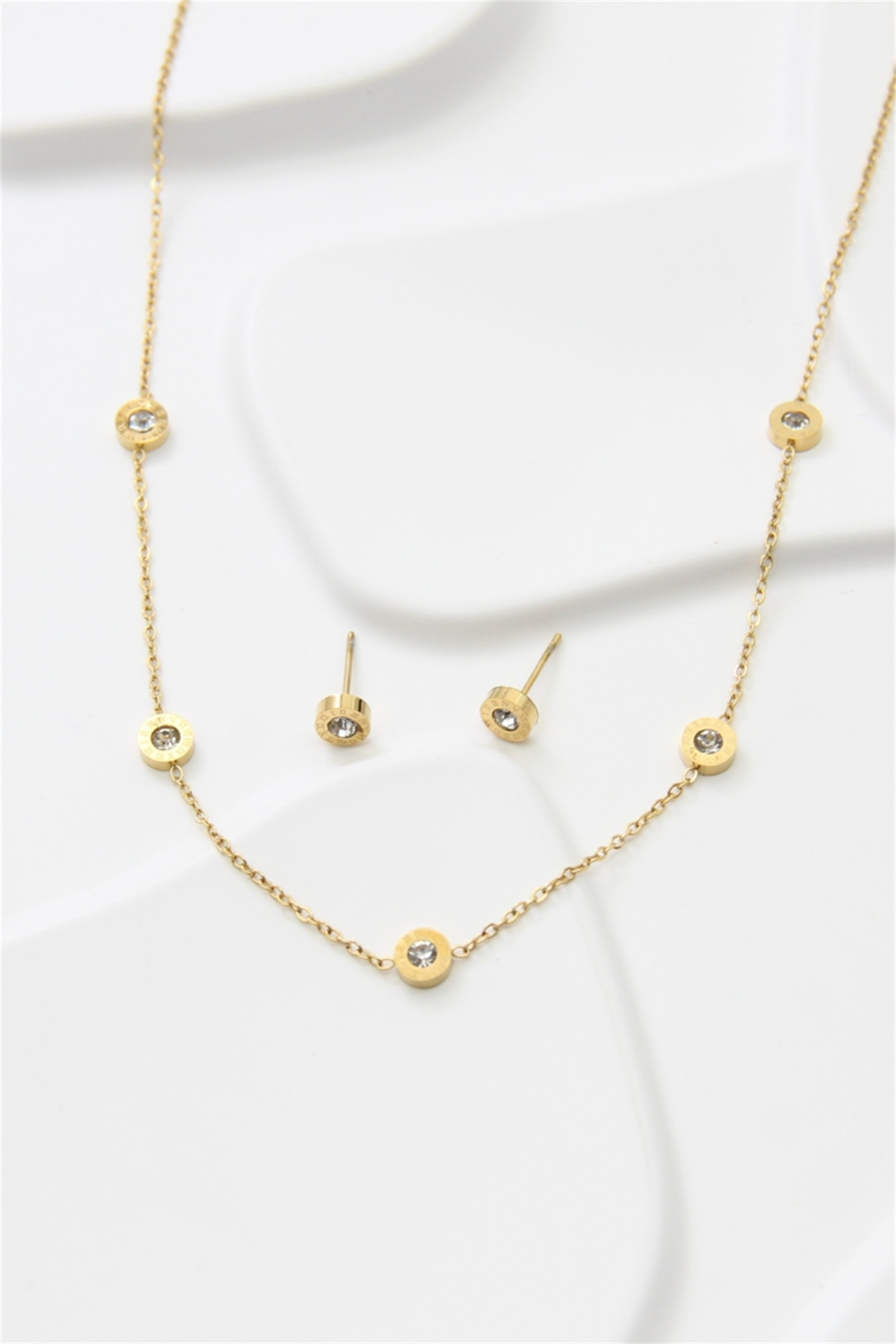 Grossiste Bellissima - Parure collier et boucles en acier inoxydable – Strass ronds