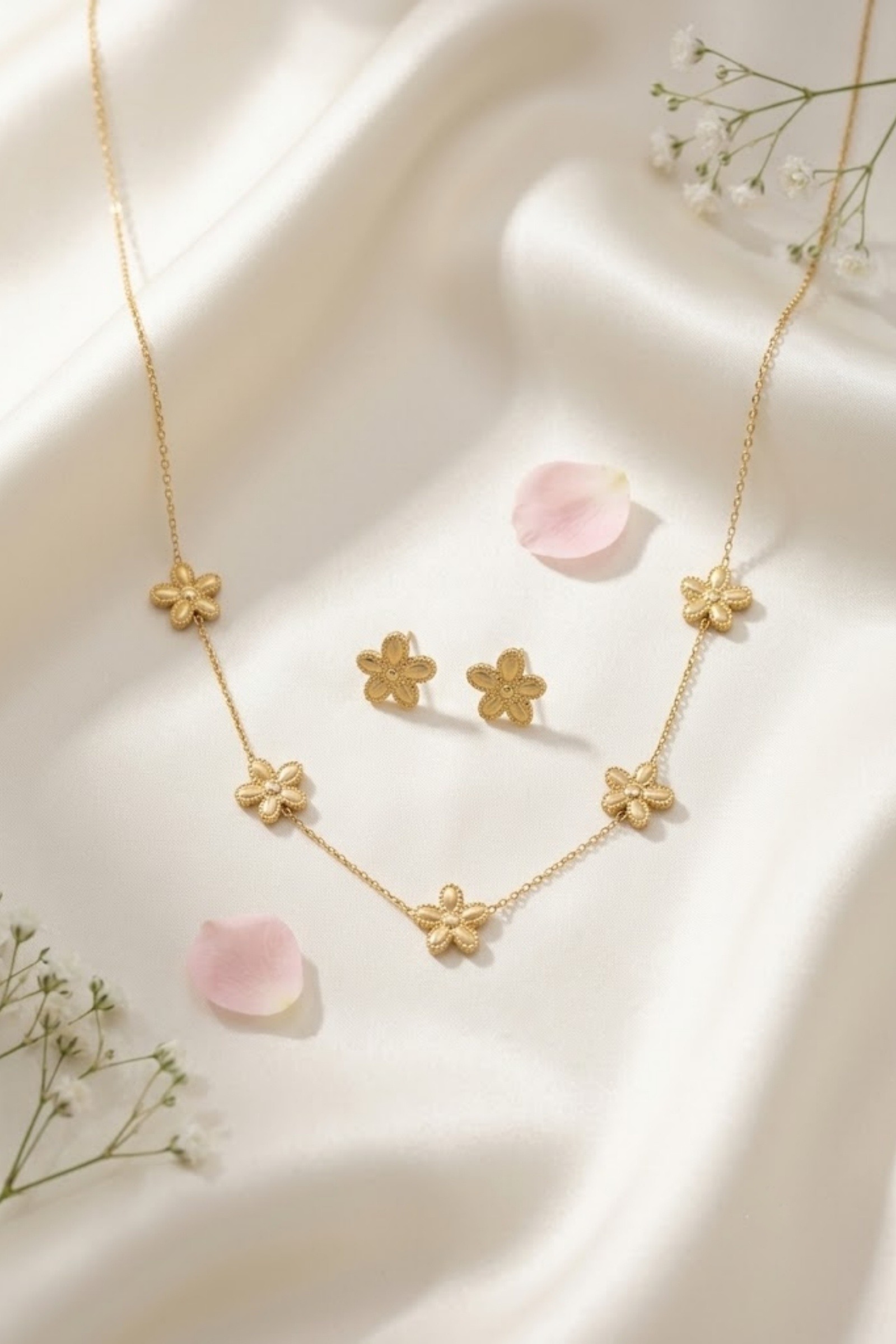 Grossiste Bellissima - Parure fleur dorée – acier inoxydable