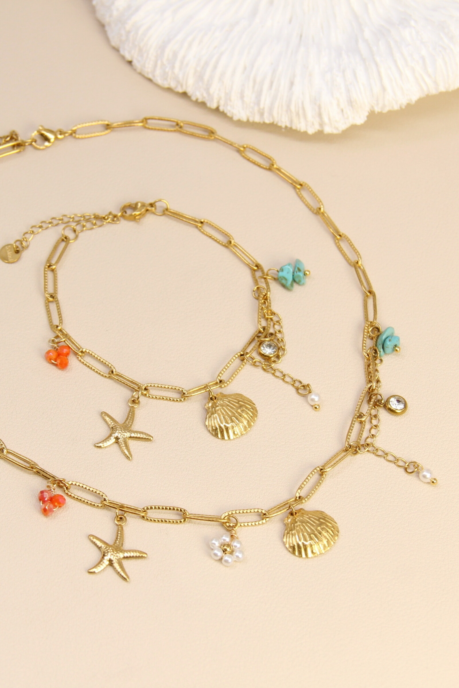 Grossista Bellissima - Set di gioielli estivi in acciaio inossidabile - collana e bracciale con ciondoli marini alla moda