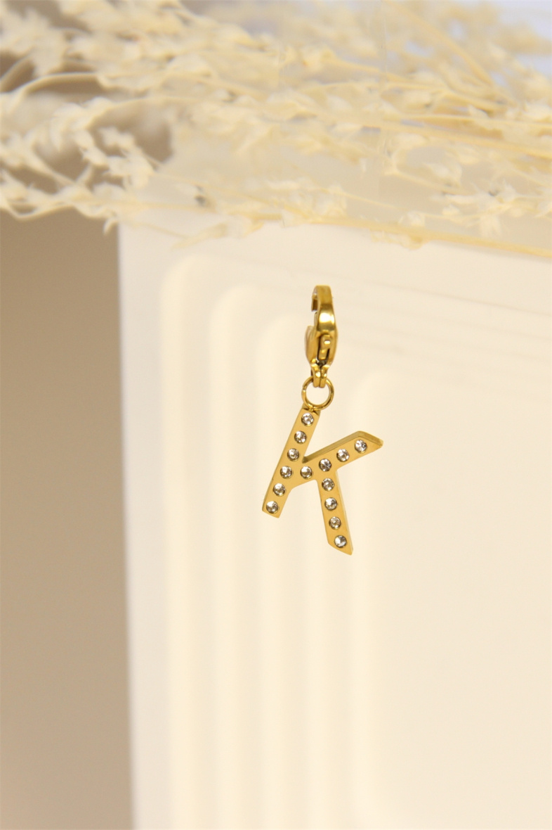 Wholesaler Bellissima - Charm's letter "K" pendant decorated with rhinestones in stainless steel