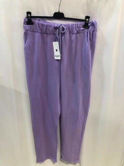 Pantalon femme en coton pur, idéal pour l'automne, alliant confort et style saisonnier.