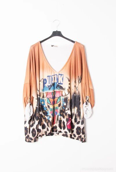 Tunique élégante en coton pur, idéale pour l'automne/hiver 2025, parfaite pour un style féminin et confortable.