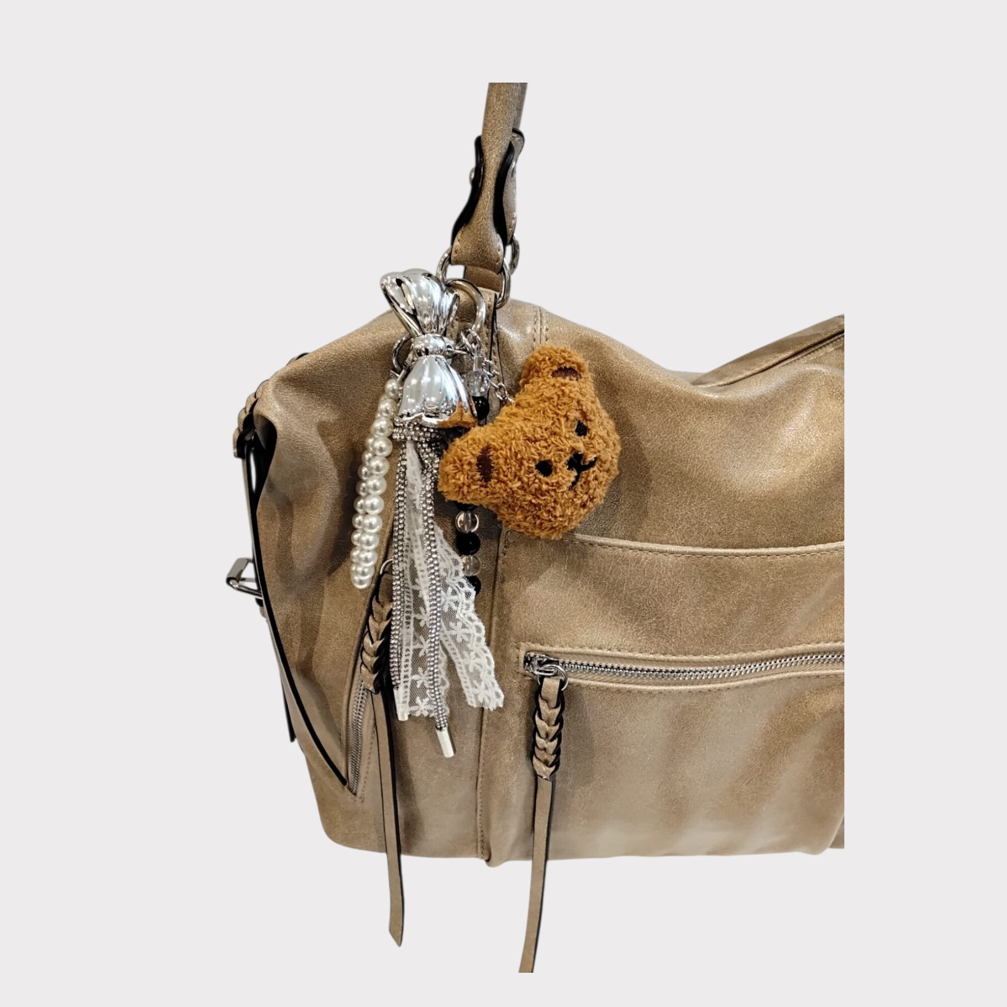 Grossista BESTINI PARIS - Ciondolo, testa d'orso, perle, fiocco e gioiello decorativo