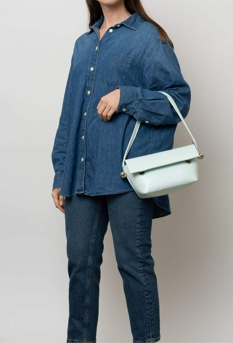 Wholesaler BESTINI - Shoulder bag with flap, magnetic and zipped closure, decorative ball
