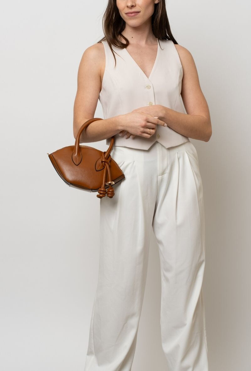 Wholesaler BESTINI - Small bag with shoulder strap, handle, and decoration, zip closure