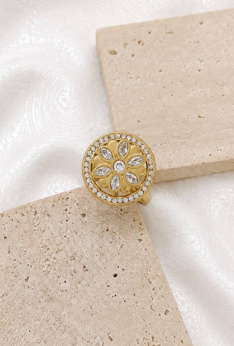 Wholesaler Bijoussimo - Women's adjustable gold-plated steel ring, rotating flower design
