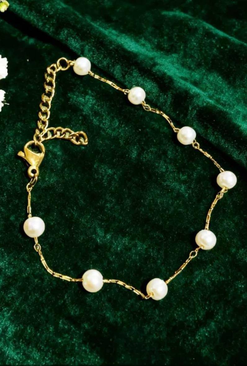 Grossiste Bijoussimo - Bracelet acier doré femme perles acryliques blanches