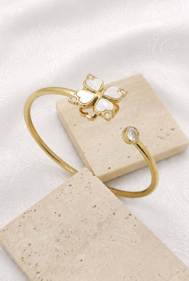 Wholesaler Bijoussimo - Women's gold-plated steel bracelet with rotating clover design