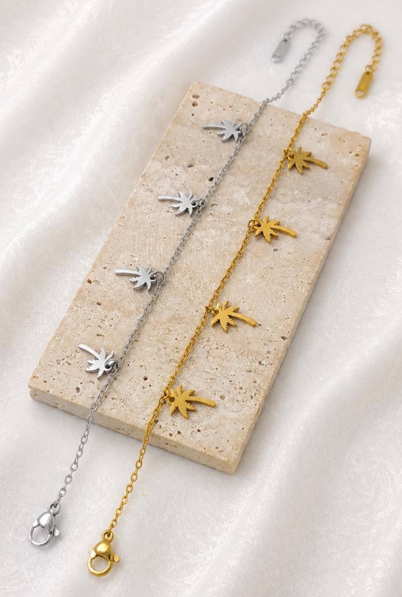 Mayorista Bijoussimo - Pulsera de acero para mujer con colgantes de palmeras