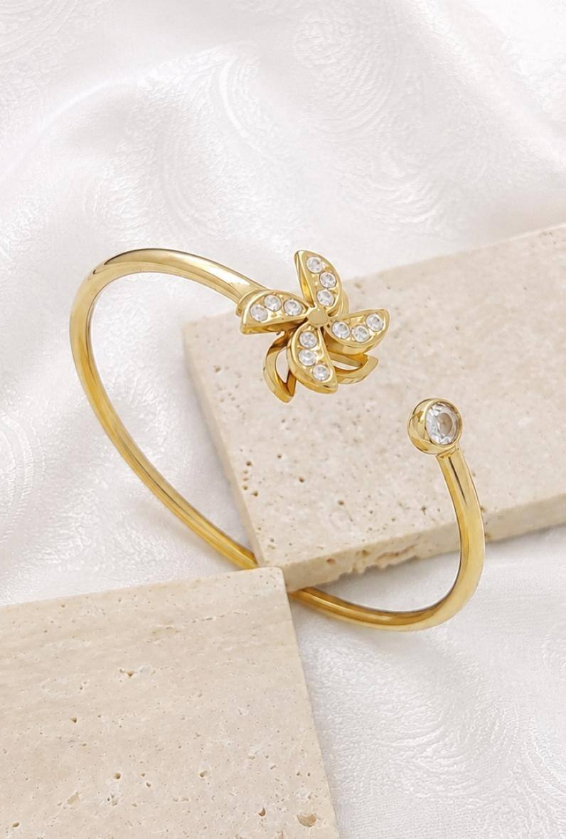 Wholesaler Bijoussimo - Women's gold-plated steel bracelet, rotating propeller design