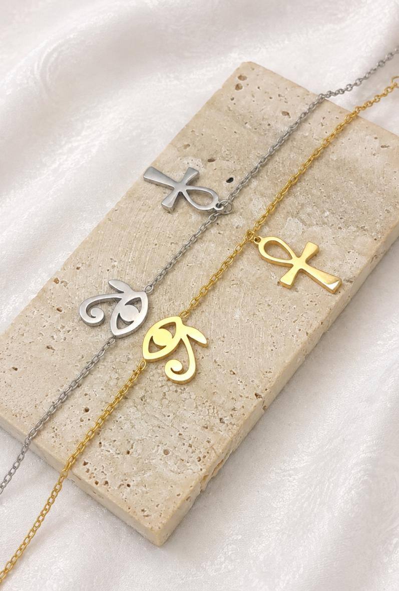 Grossiste Bijoussimo - Bracelet acier femme, croix égyptienne Ankh et œil de Râ (15cm+5cm)