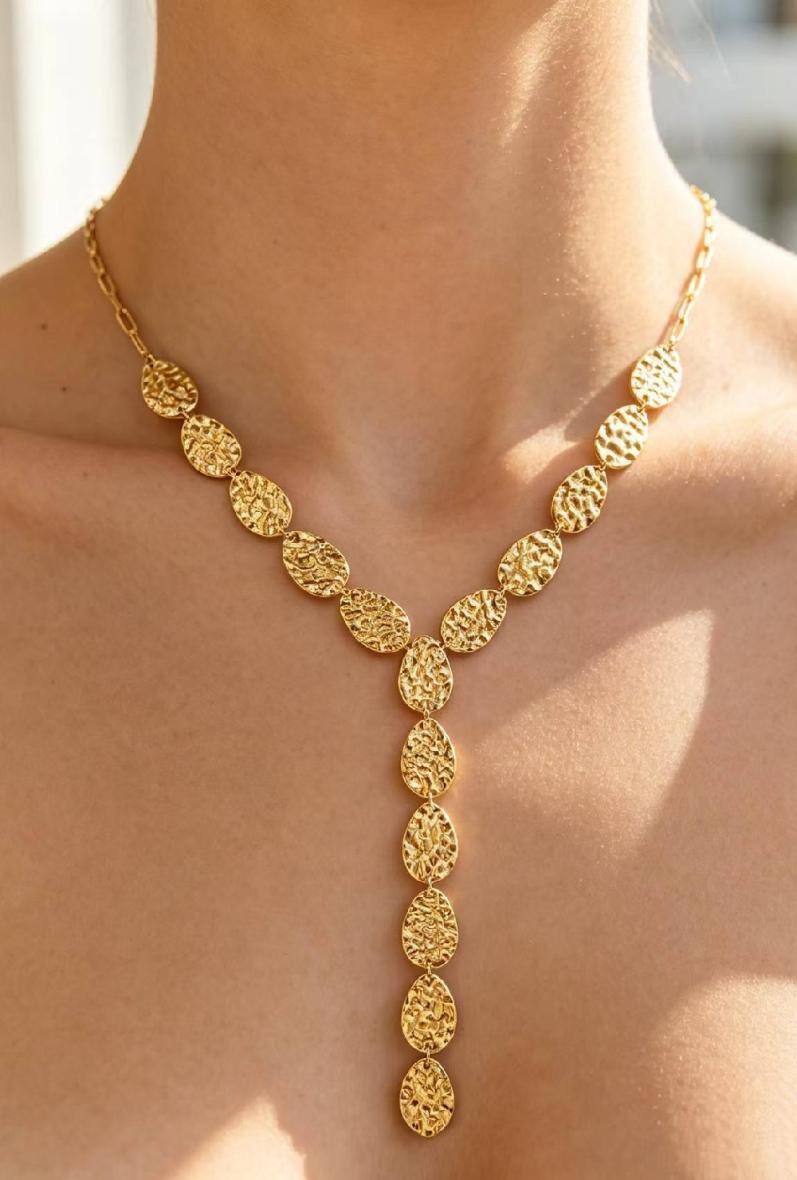 Grossiste Bijoussimo - Collier acier doré en Y/cravate femme, ovales martelés