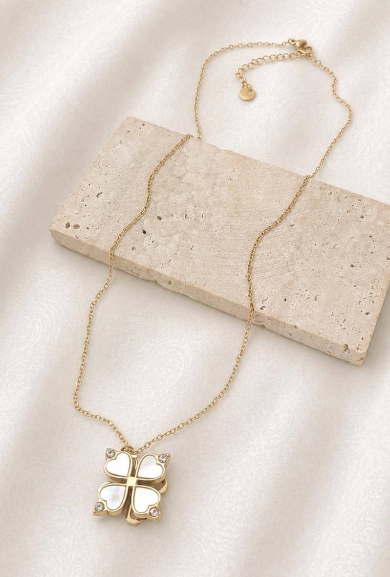 Grossiste Bijoussimo - Collier acier doré femme, pendentif rotatif motif trèfle