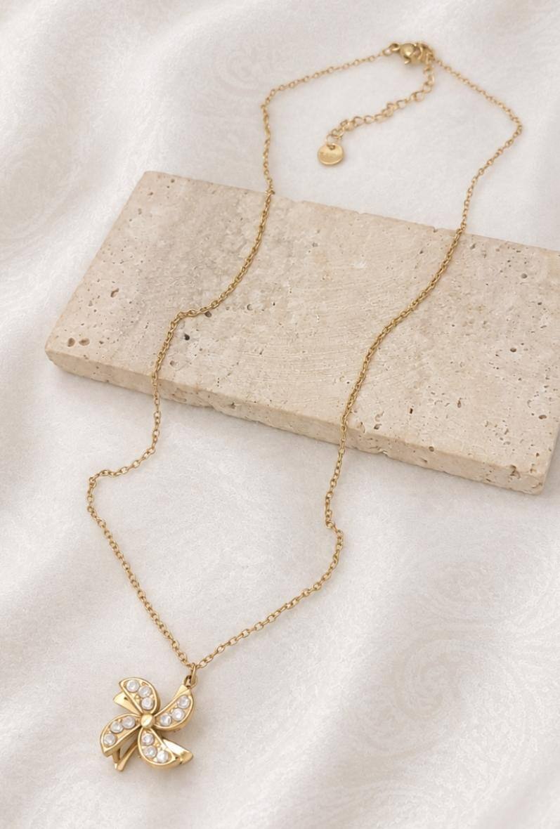 Mayorista Bijoussimo - Collar de acero dorado para mujer, colgante giratorio con diseño de hélice