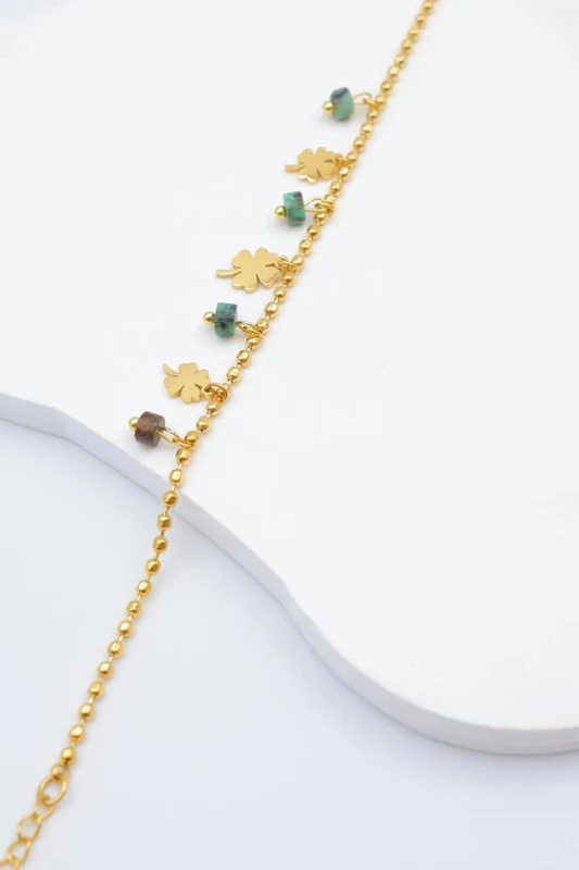 Großhändler Bijoux Mystères - Armband mit Kleeblattmustern und zylindrischen Steinen