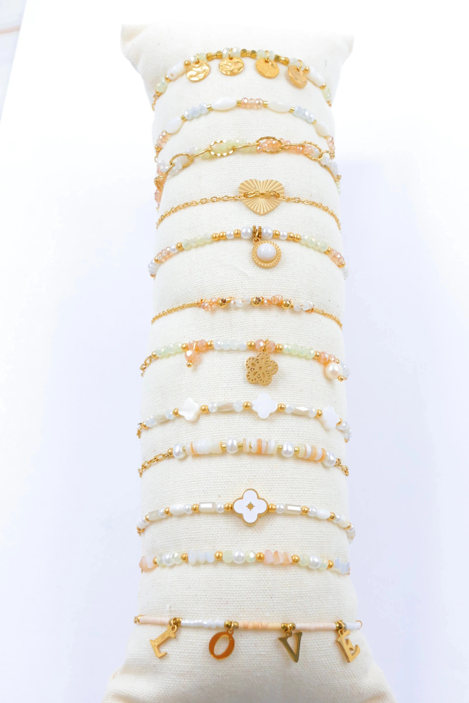 Grossiste Bijoux Mystères - Lot de 12 bracelets en acier inoxydable avec coussin