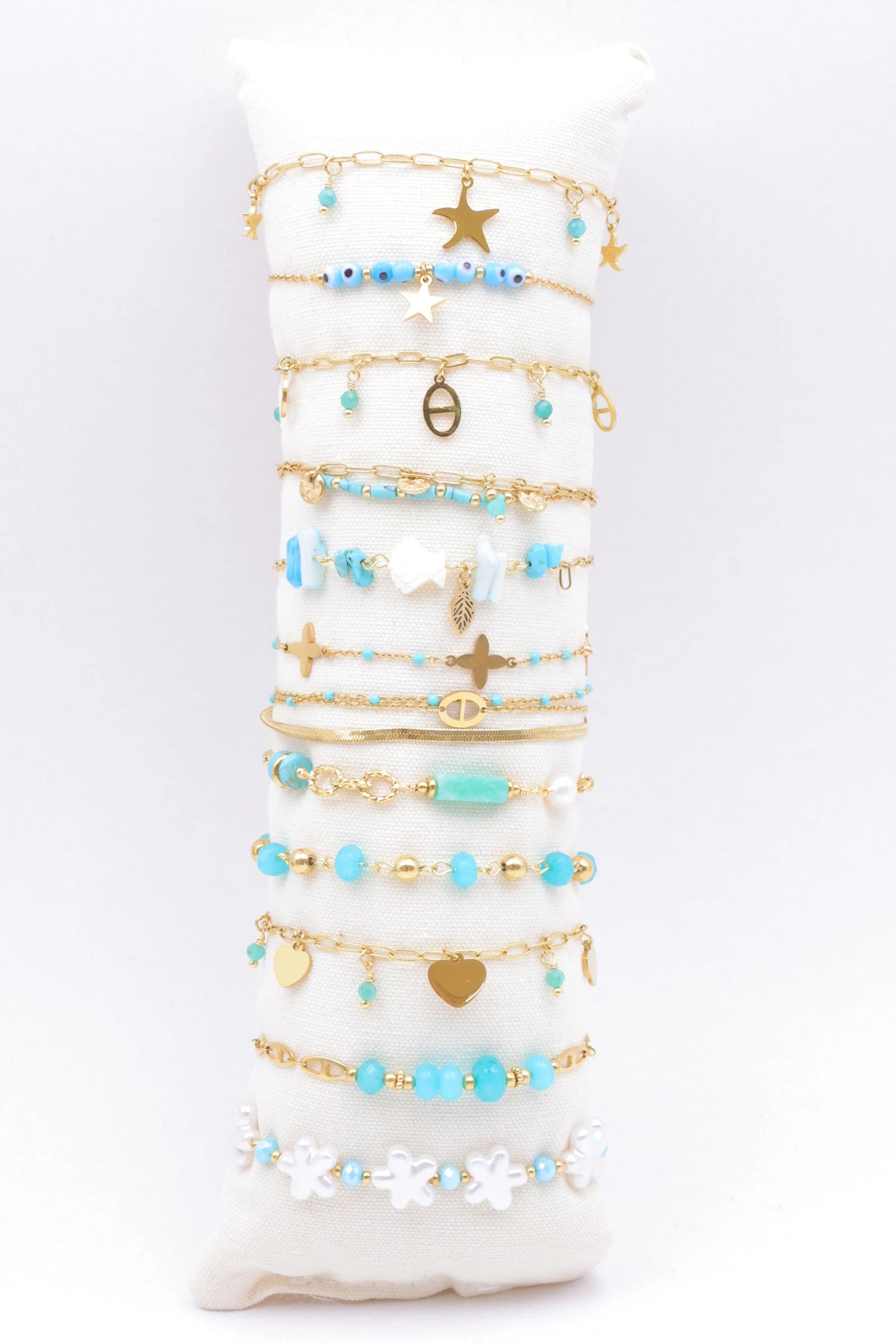 Grossiste Bijoux Mystères - Lot de 12 bracelets en acier inoxydable avec coussin