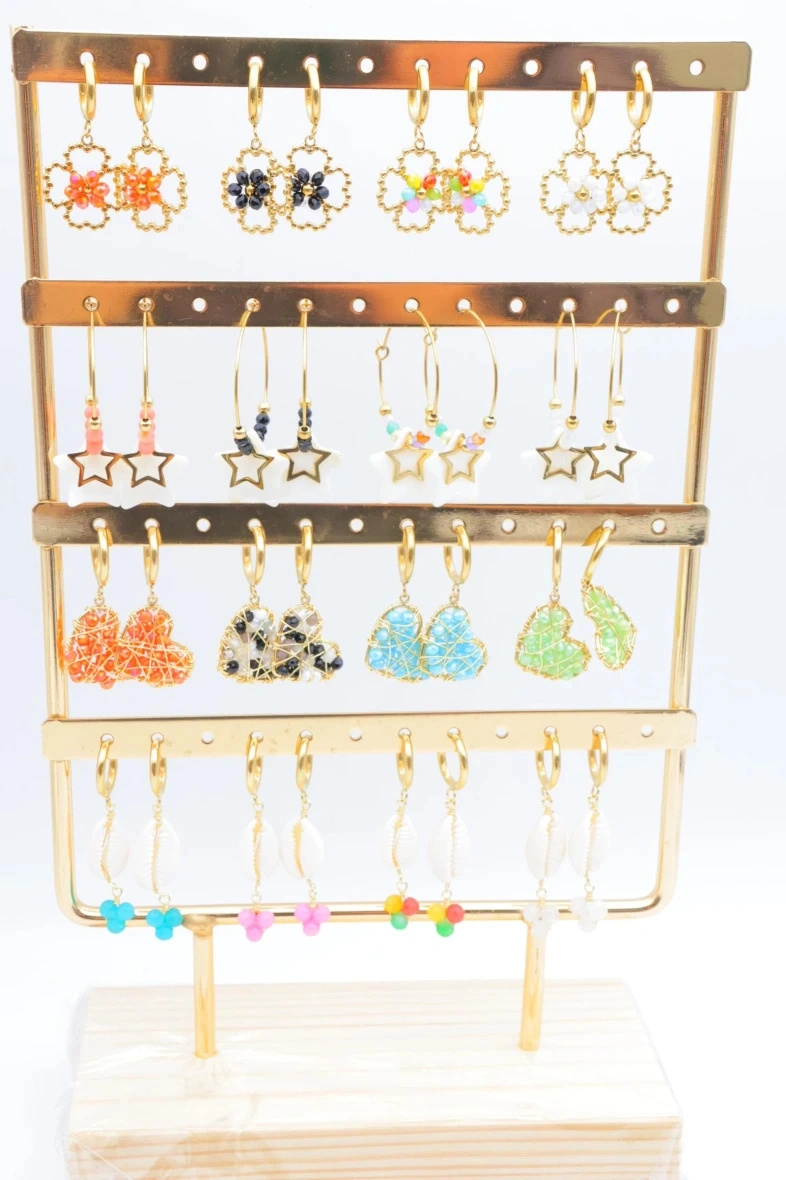 Grossista Bijoux Mystères - Set di 16 paia di orecchini con espositore